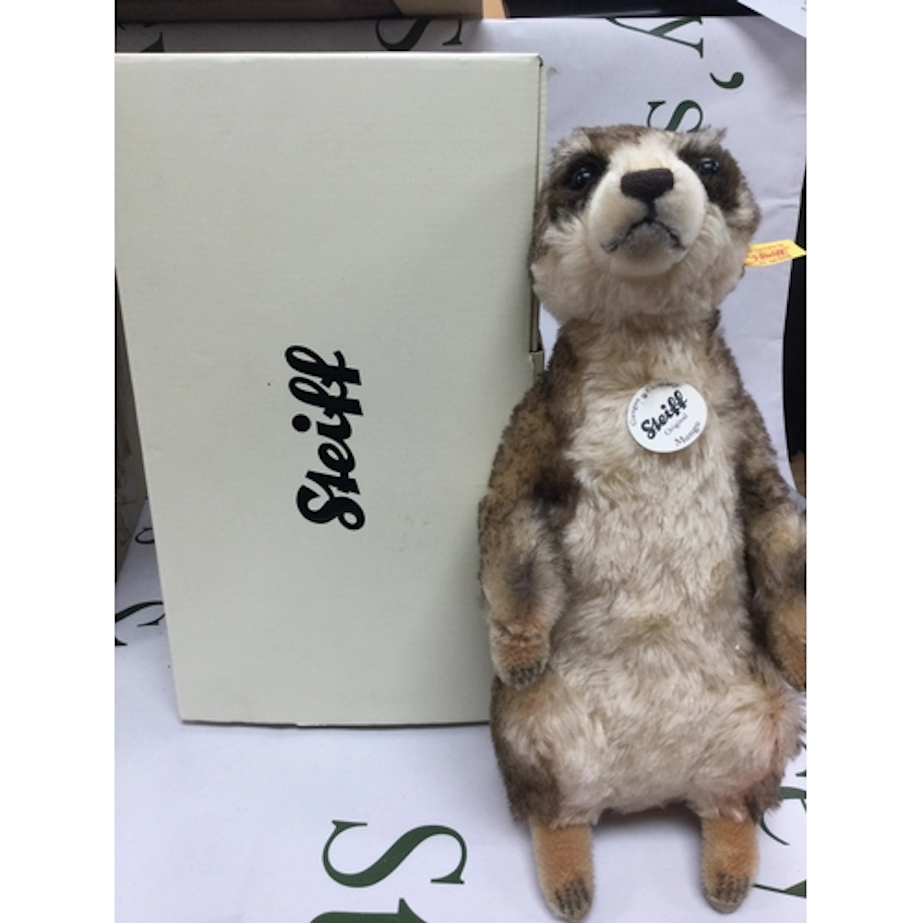 A boxed Steiff meerkat. Height 32cm.