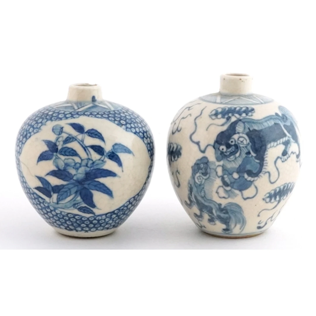 Two small Chinese globular blue and white jars, one hand pai...