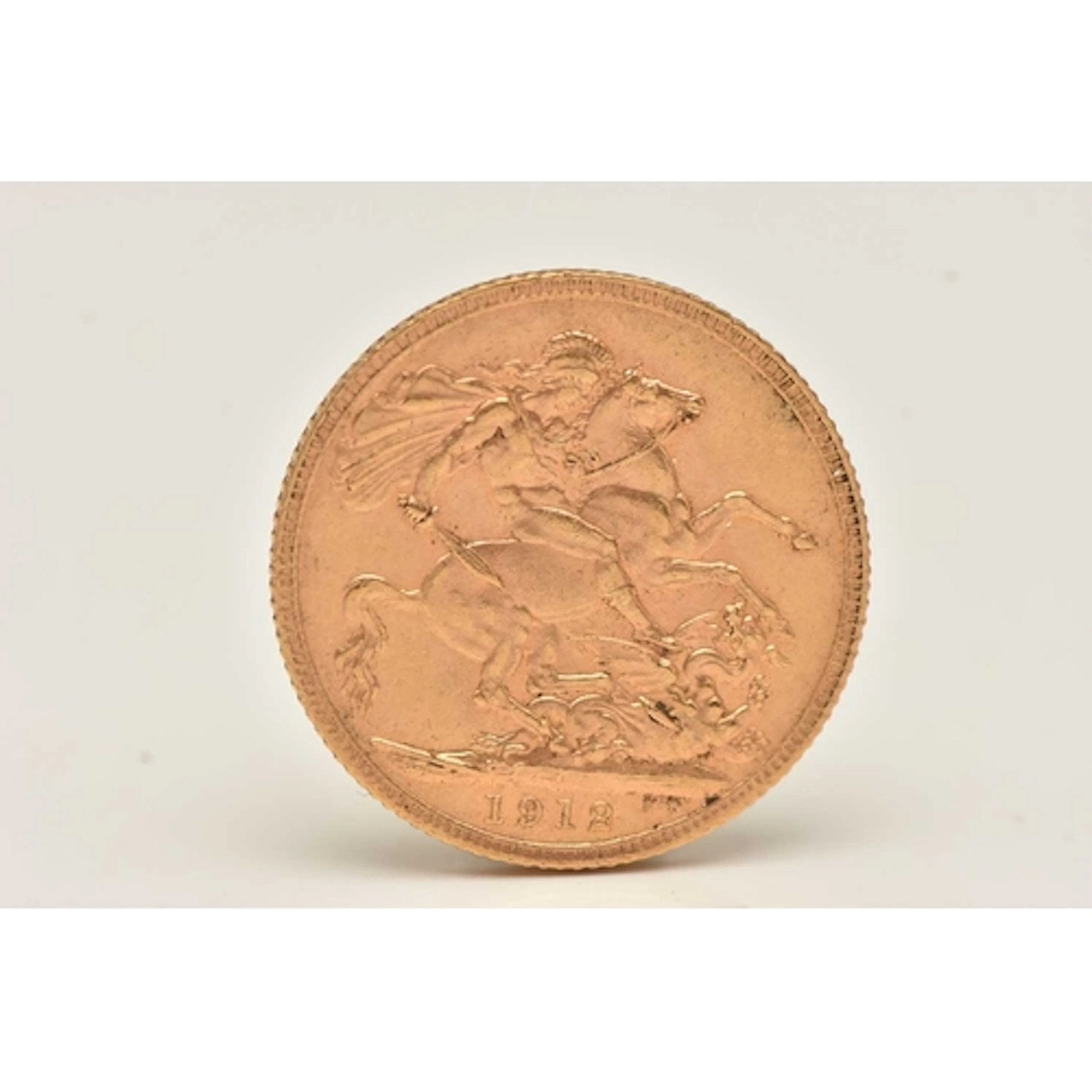 A GEORGE V FULL GOLD SOVEREIGN, dated 1912, approximate diam...