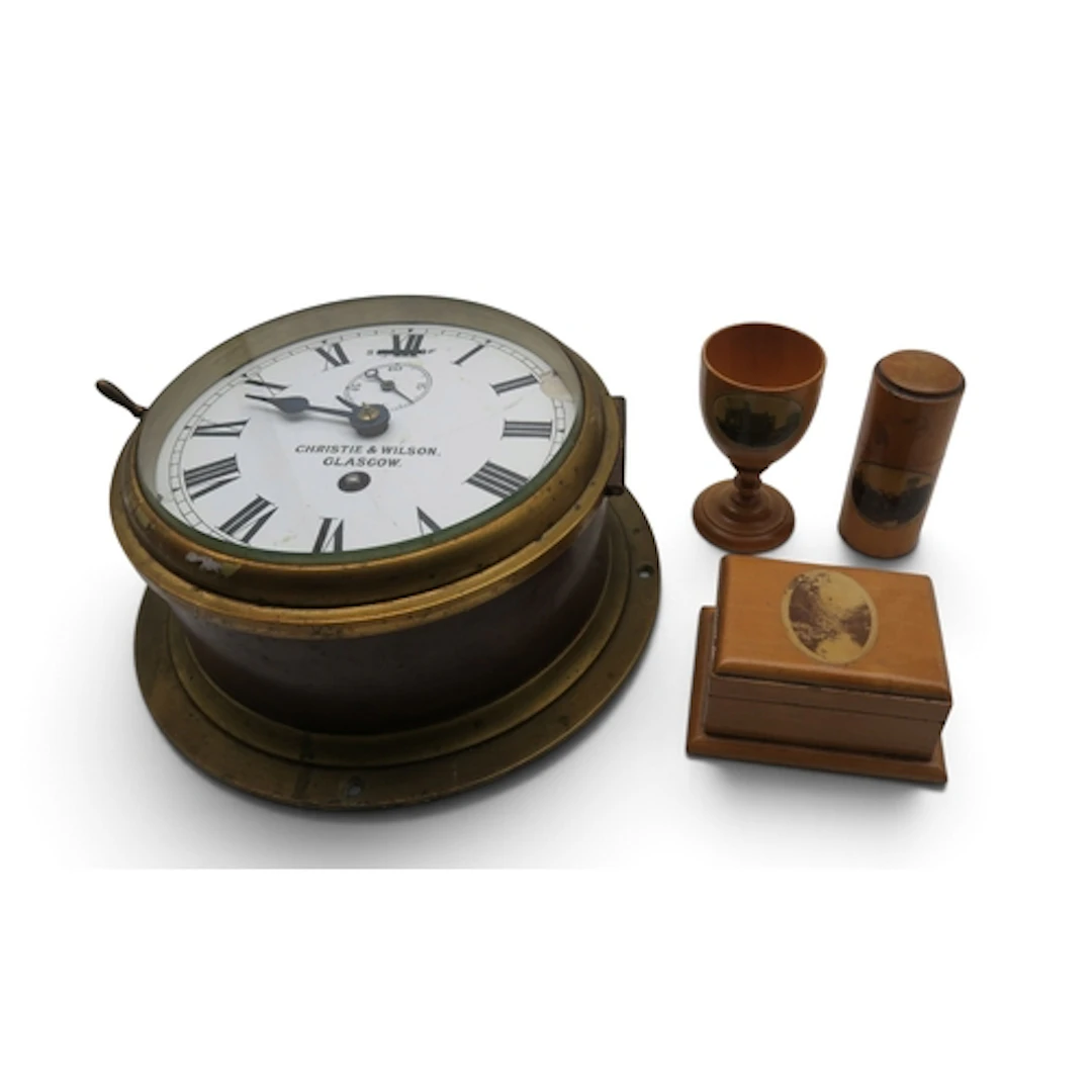 A brass maritime bulkhead clock by Christie & Wilson of ...