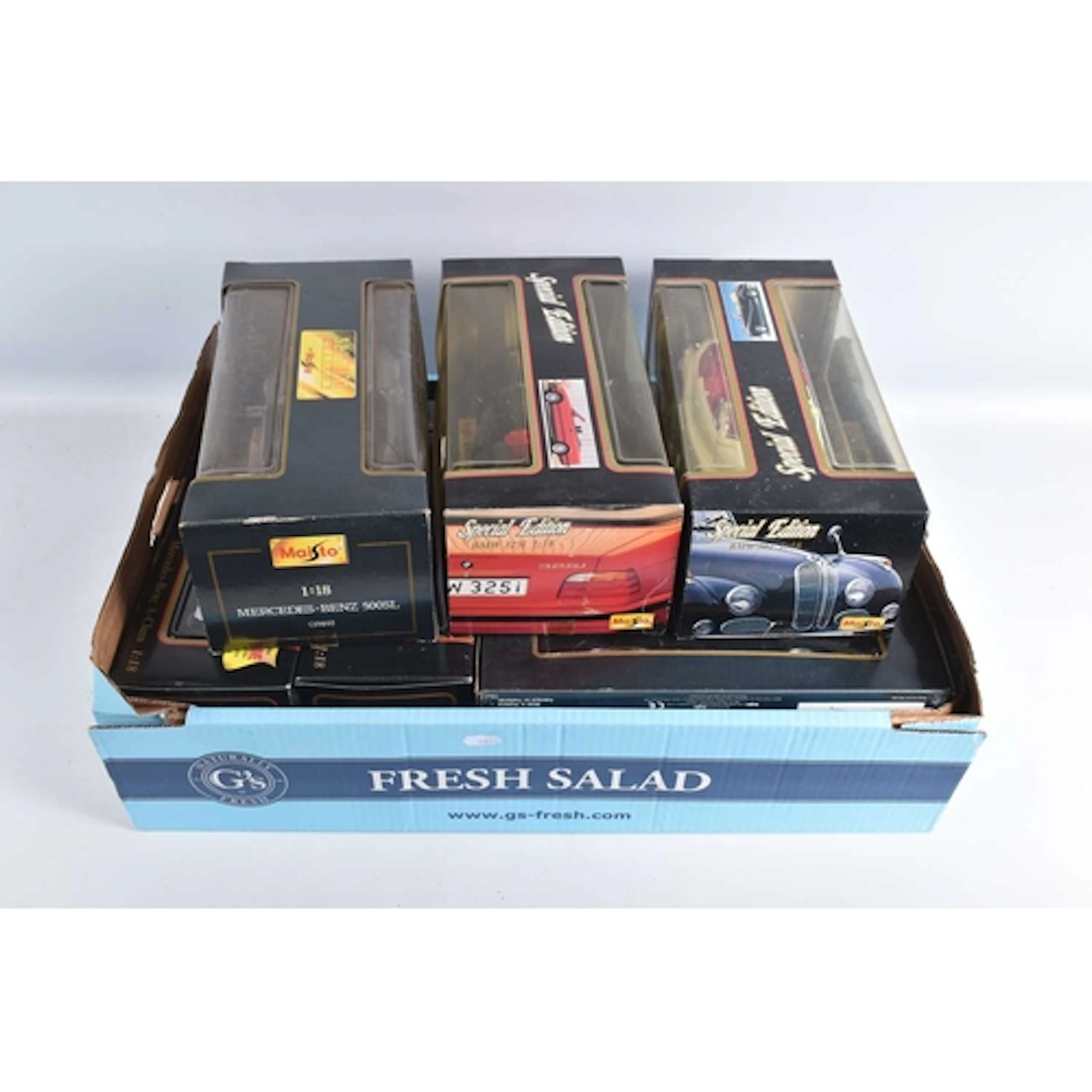EIGHT MAISTO 1:18 SCALE DIECAST MODEL VEHICLES, to include a...