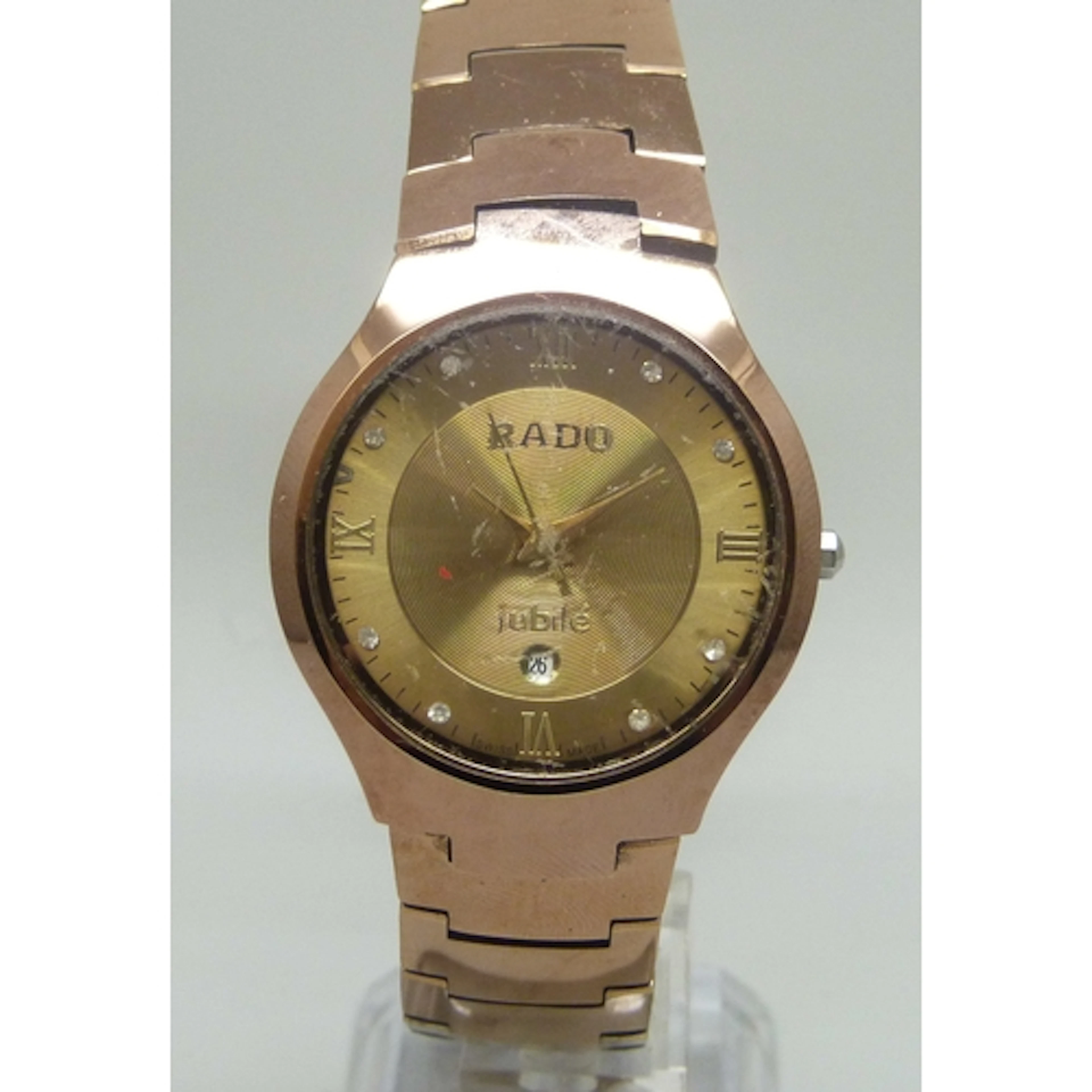 A Rado Jubilé wristwatch, gold tone dial and rose gold tone ...