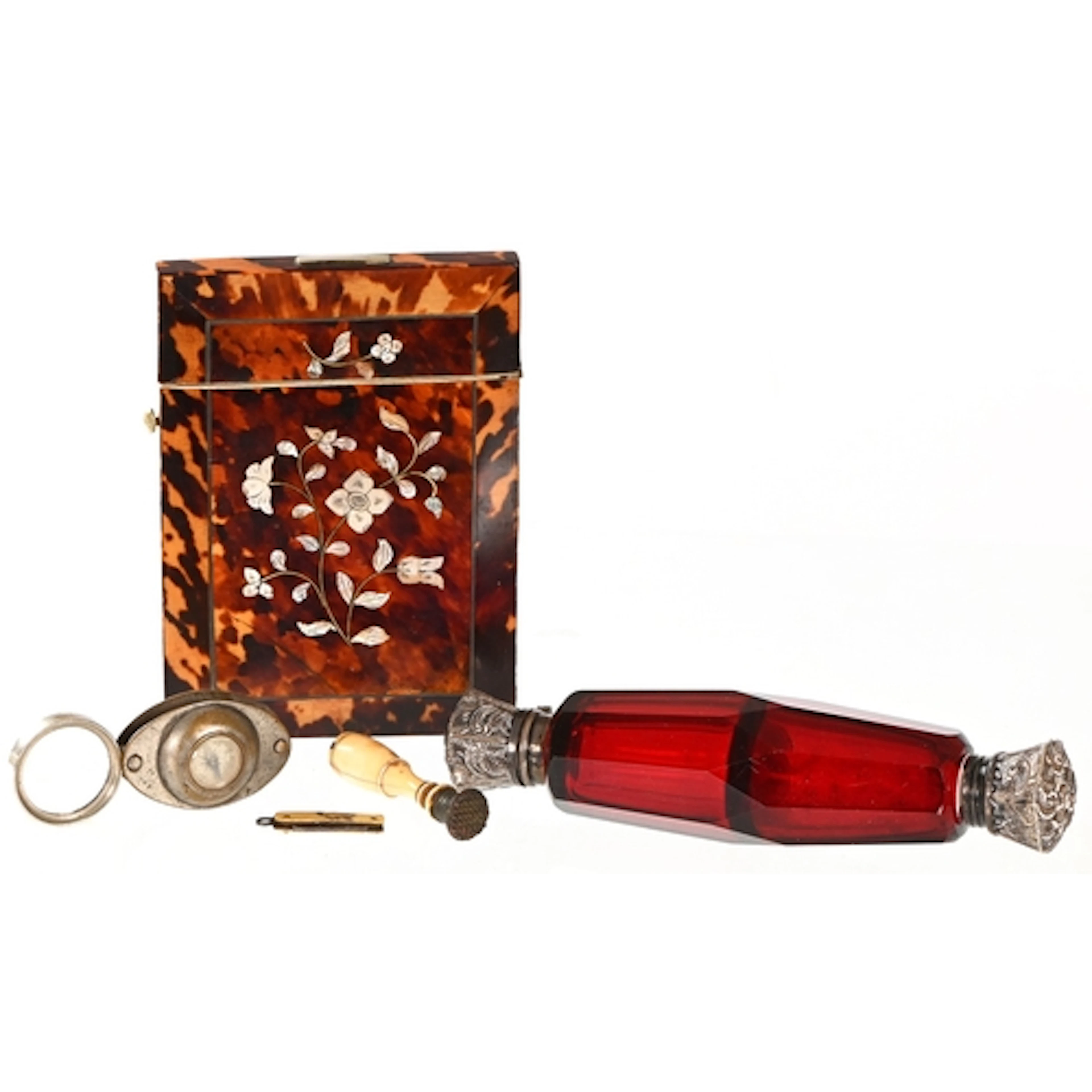 A Victorian tortoiseshell card case inlaid with mother of pe...
