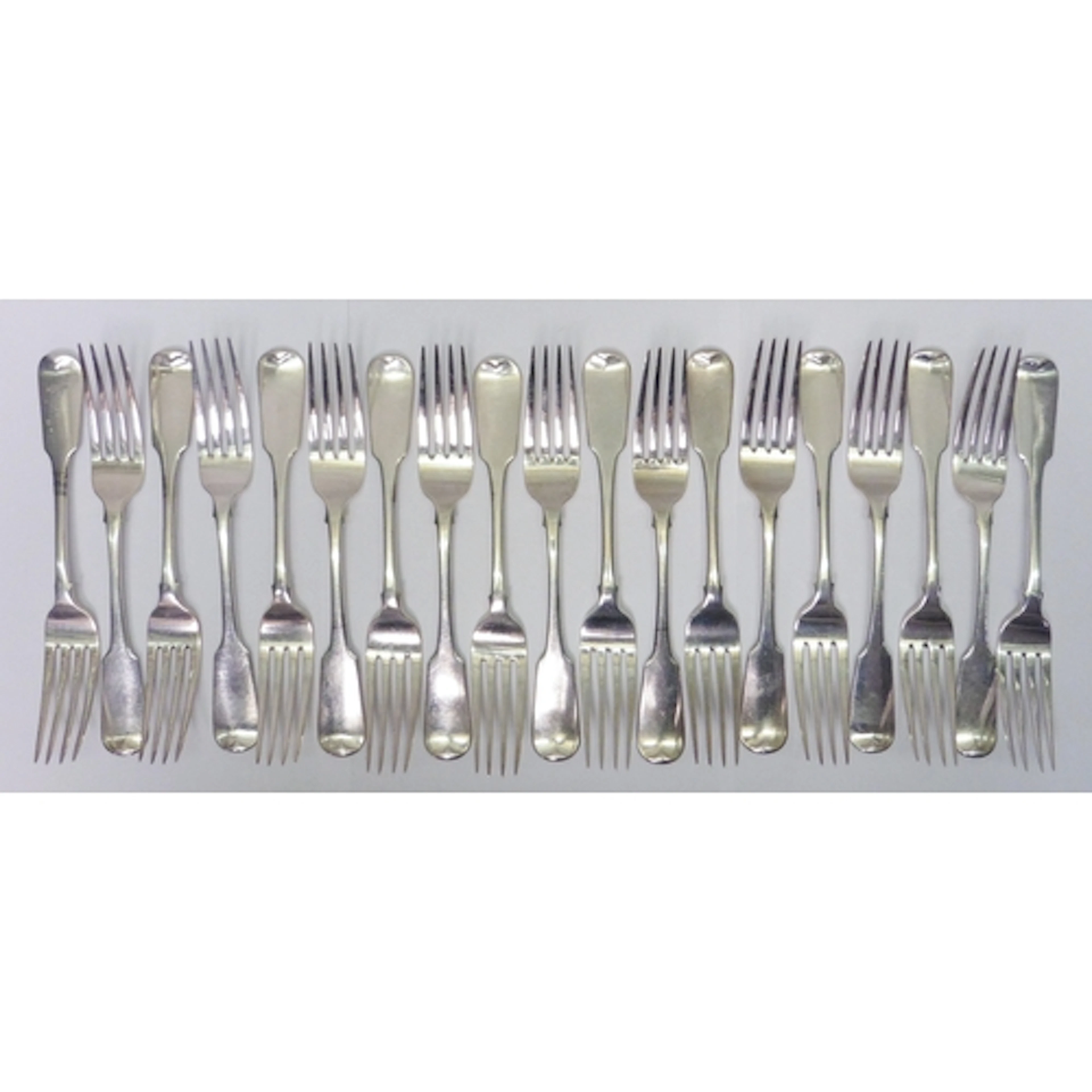 A set of nineteen George III Irish silver fiddle pattern tab...