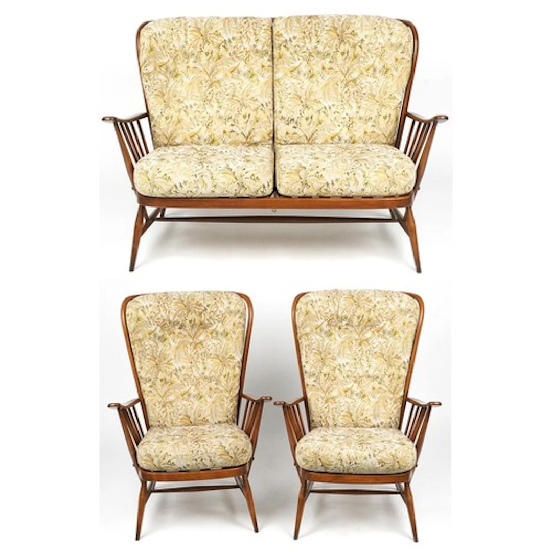 Ercol Windsor three piece lounge suite comprising a two seat...