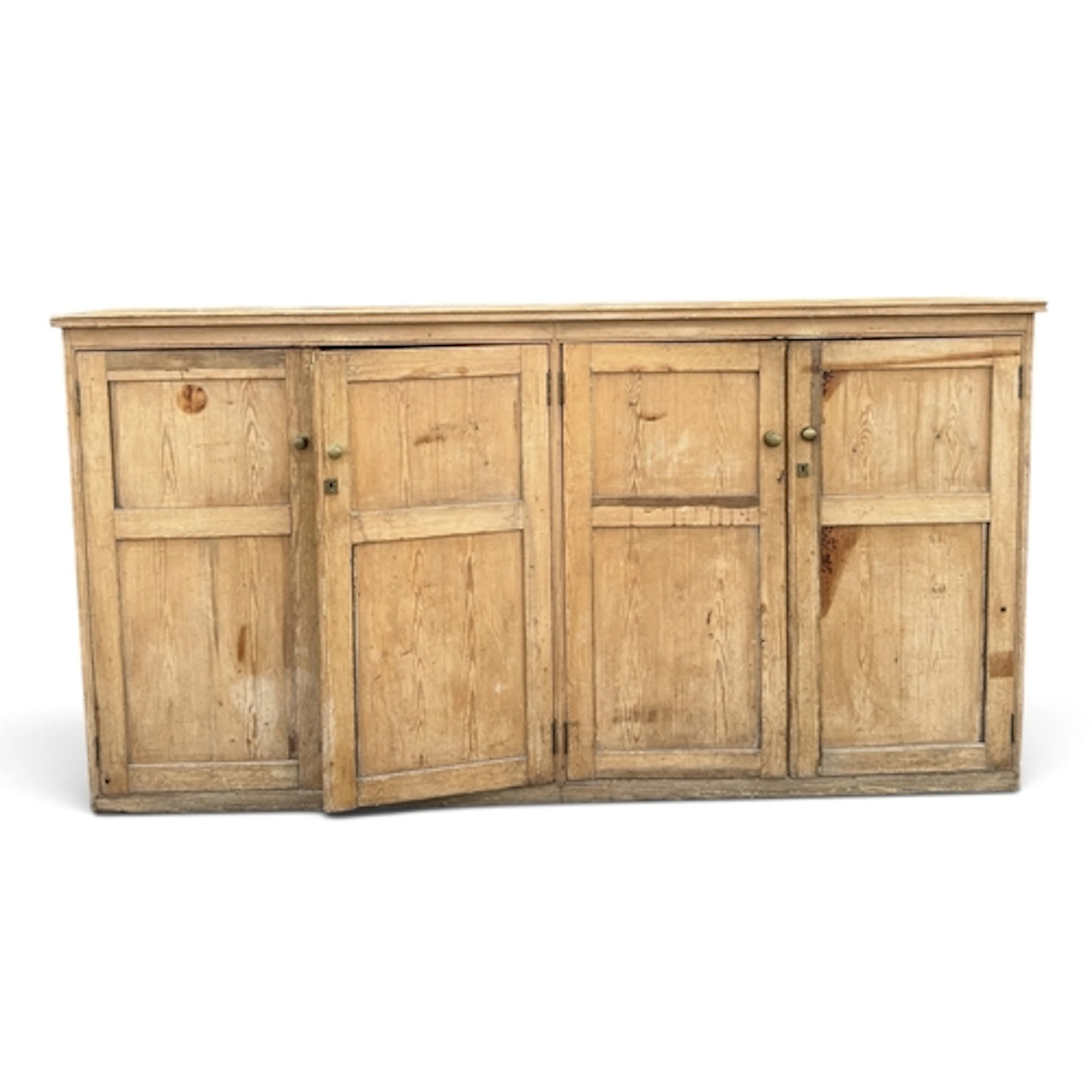 A VICTORIAN PINE CUPBOARD WITH FOUR DOORS 233cm x 122cm x 42...