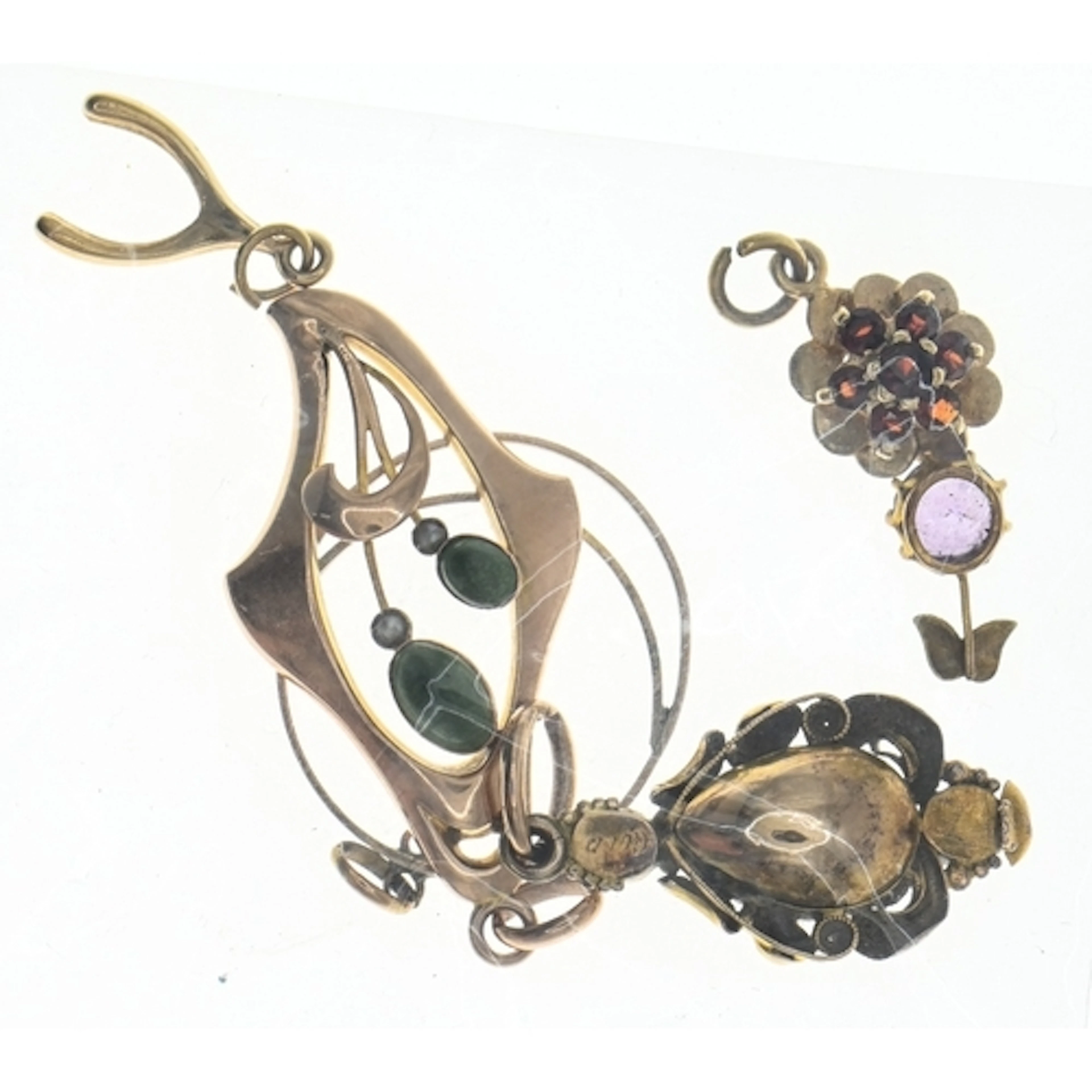 Three gem-set pendants, comprising: one Victorian marked 'GO...