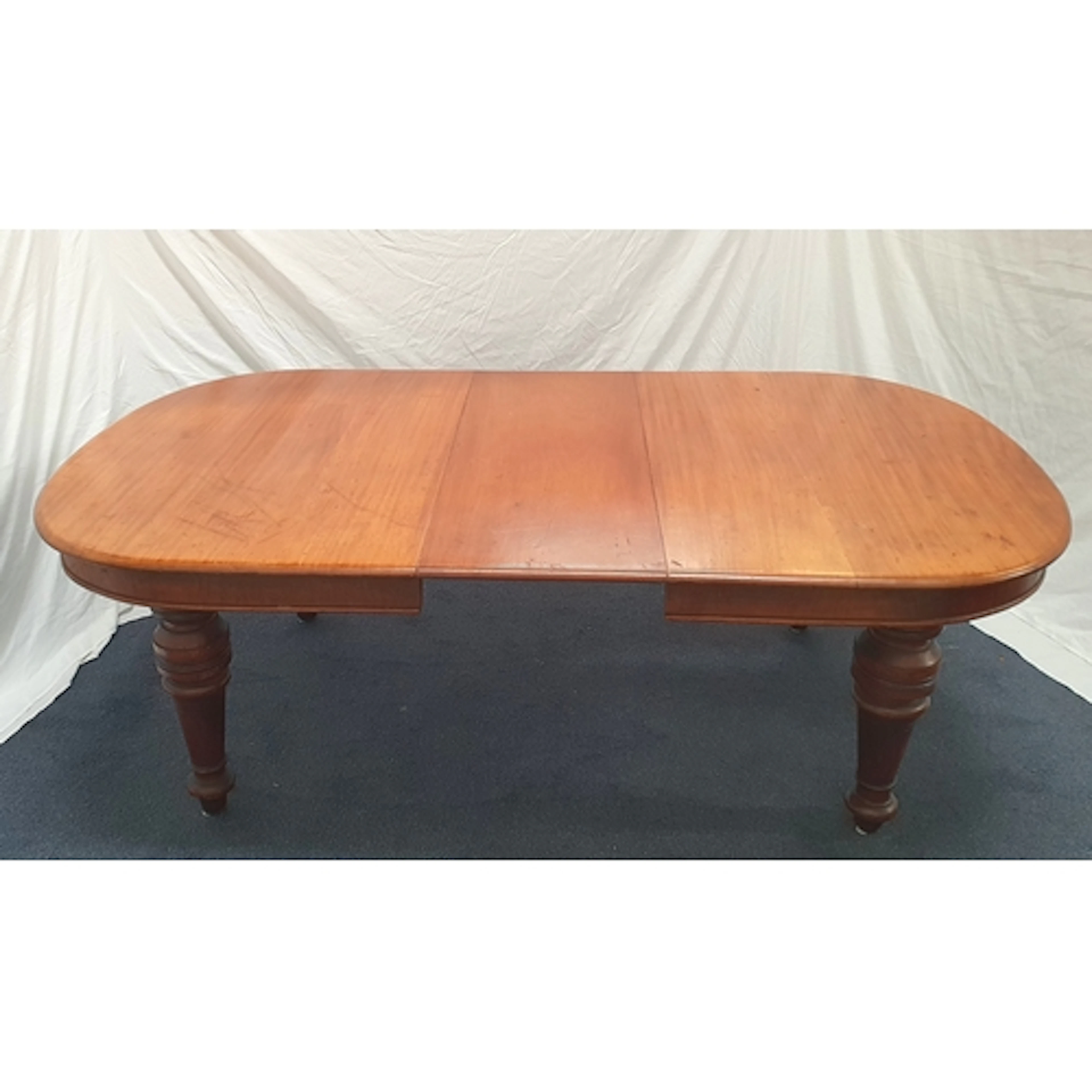 VICTORIAN MAHOGANY EXTENDING DINING TABLE with one additiona...