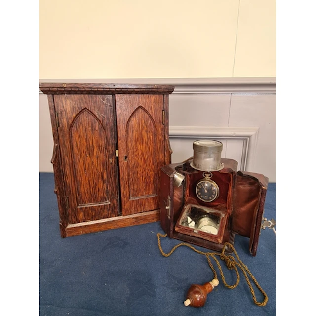 A miniature table top Book Cupboard with pair of arched door...