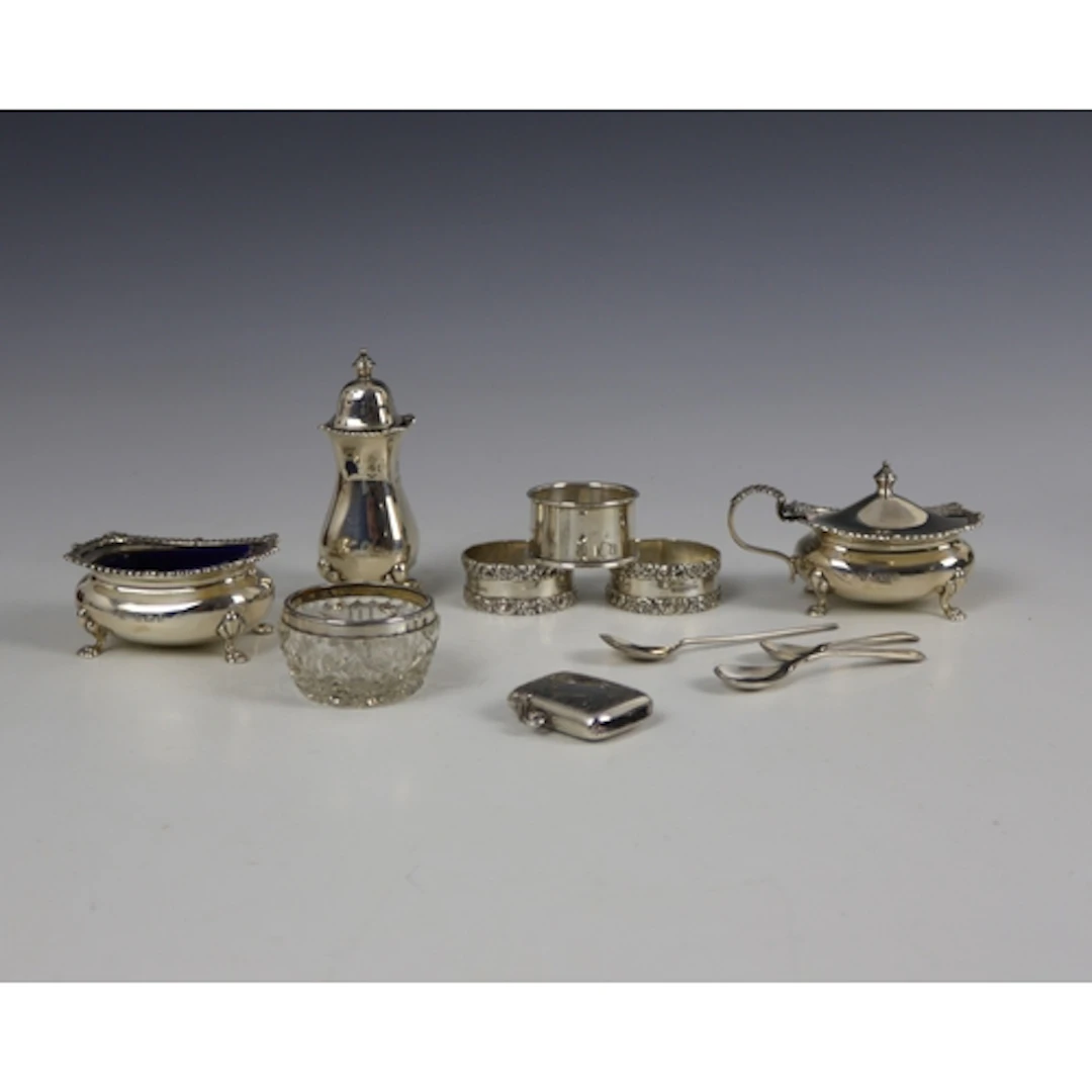 A selection of silver, including a George V silver condiment...