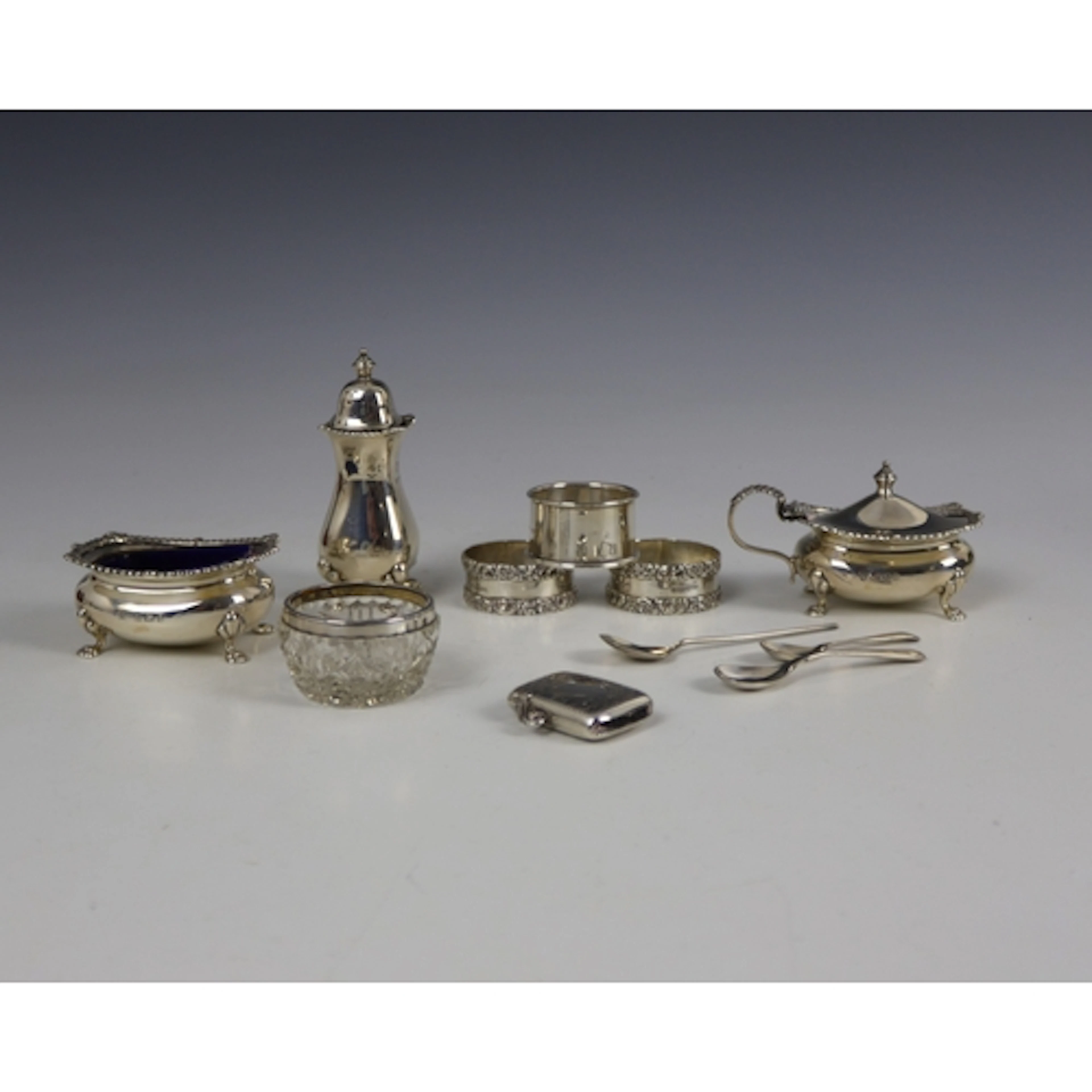 A selection of silver, including a George V silver condiment...