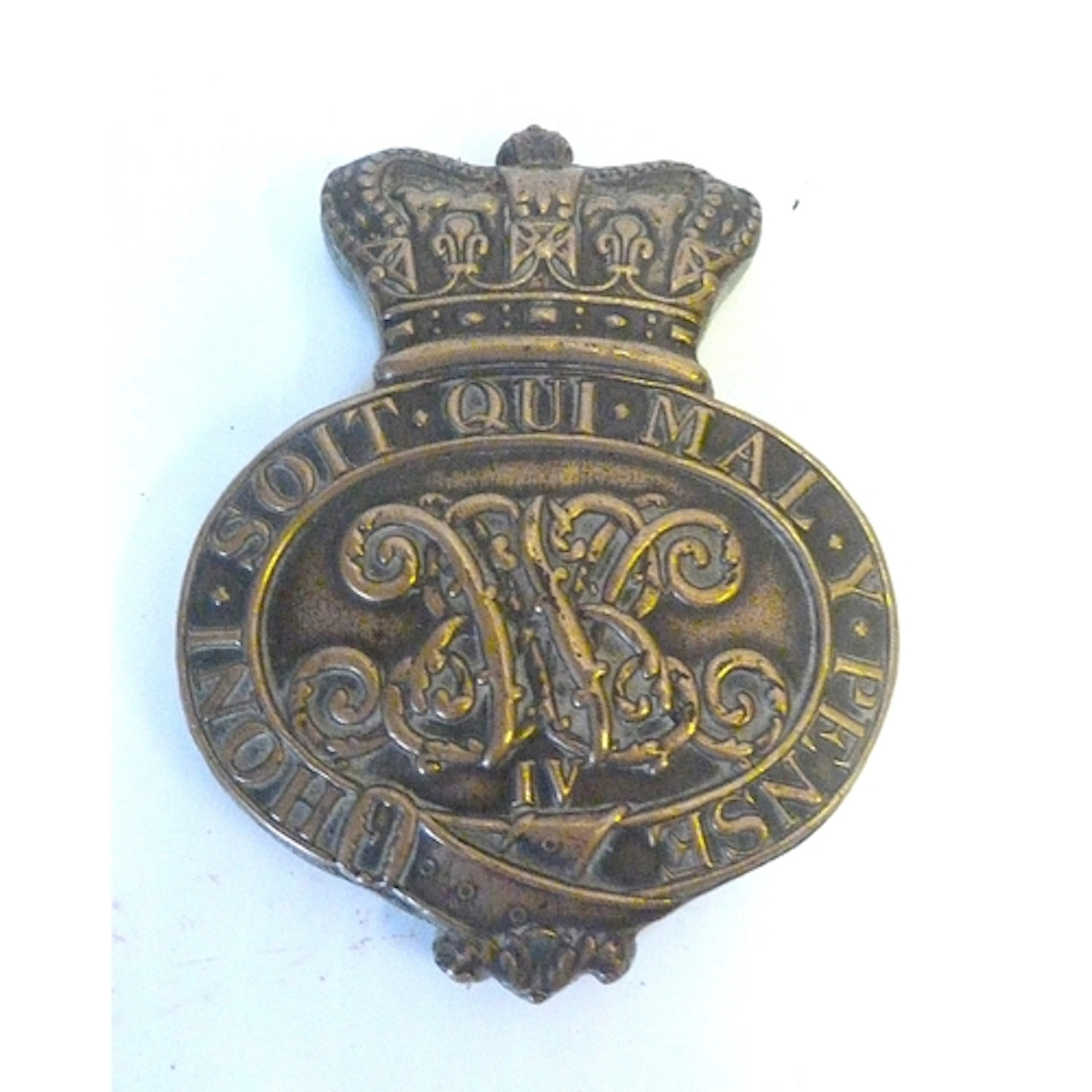 Cast brass helmet badge mounted on metal plaque now as a pap...