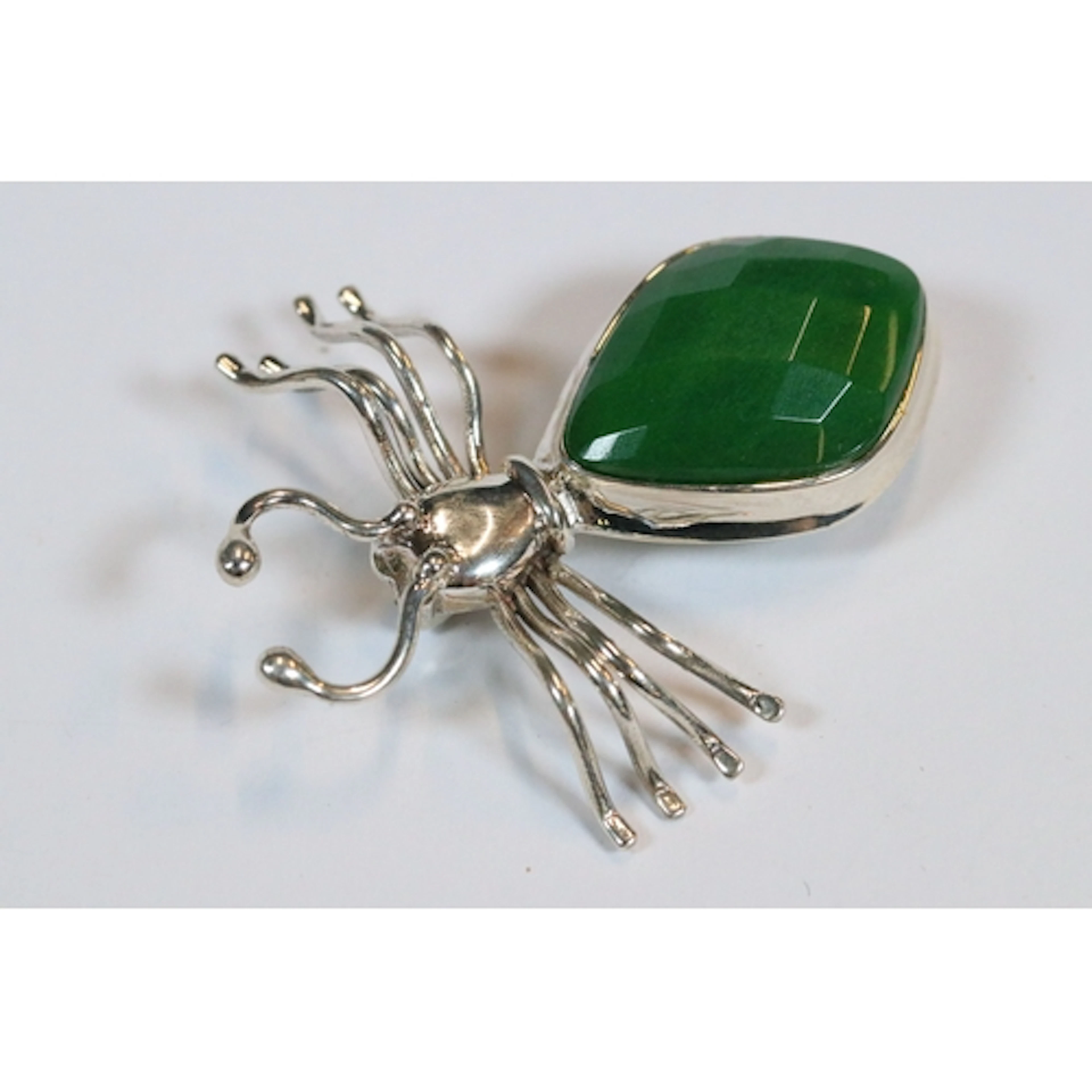 Silver and jade bug brooch