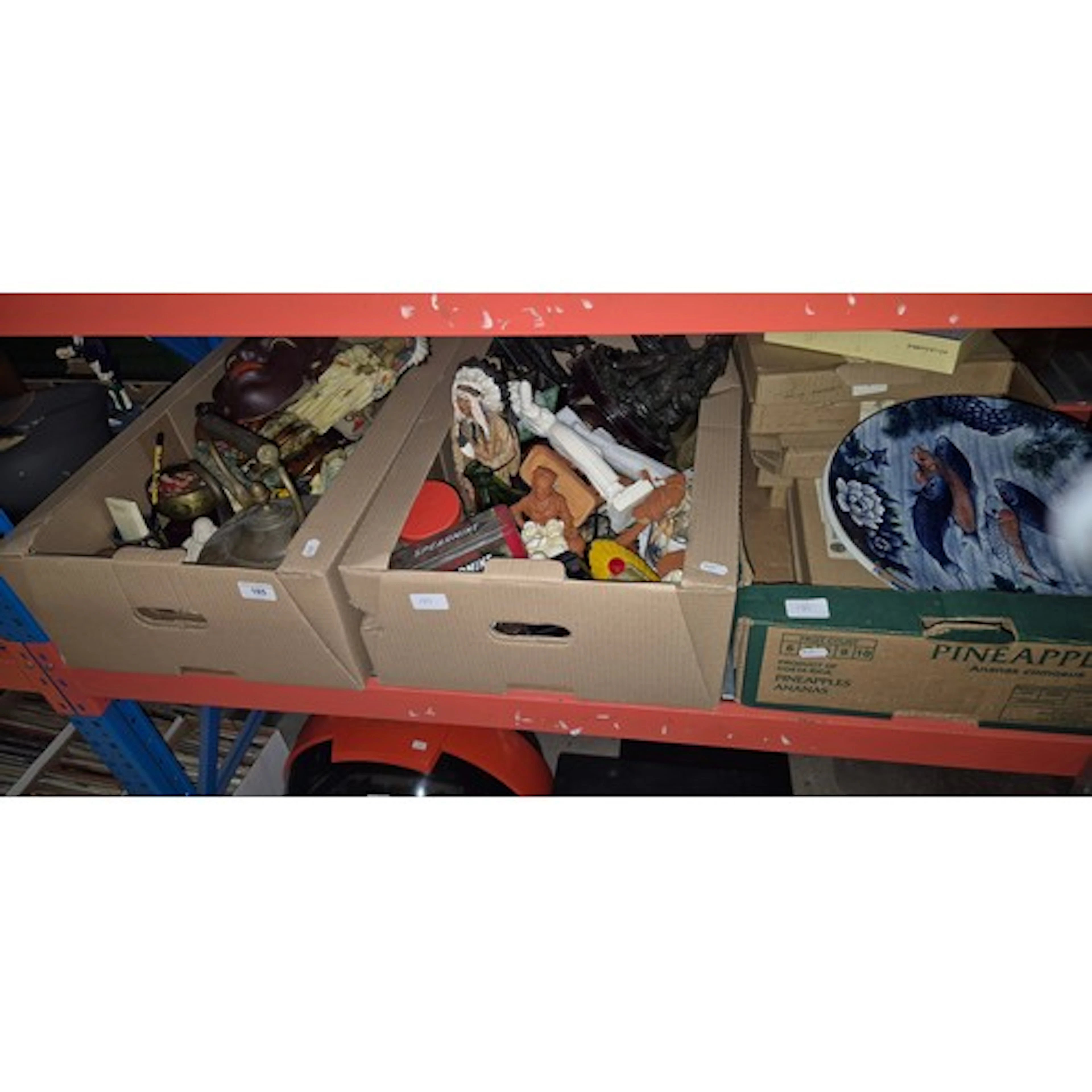 Three boxes of figurines, collectors plates, old tins and bo...