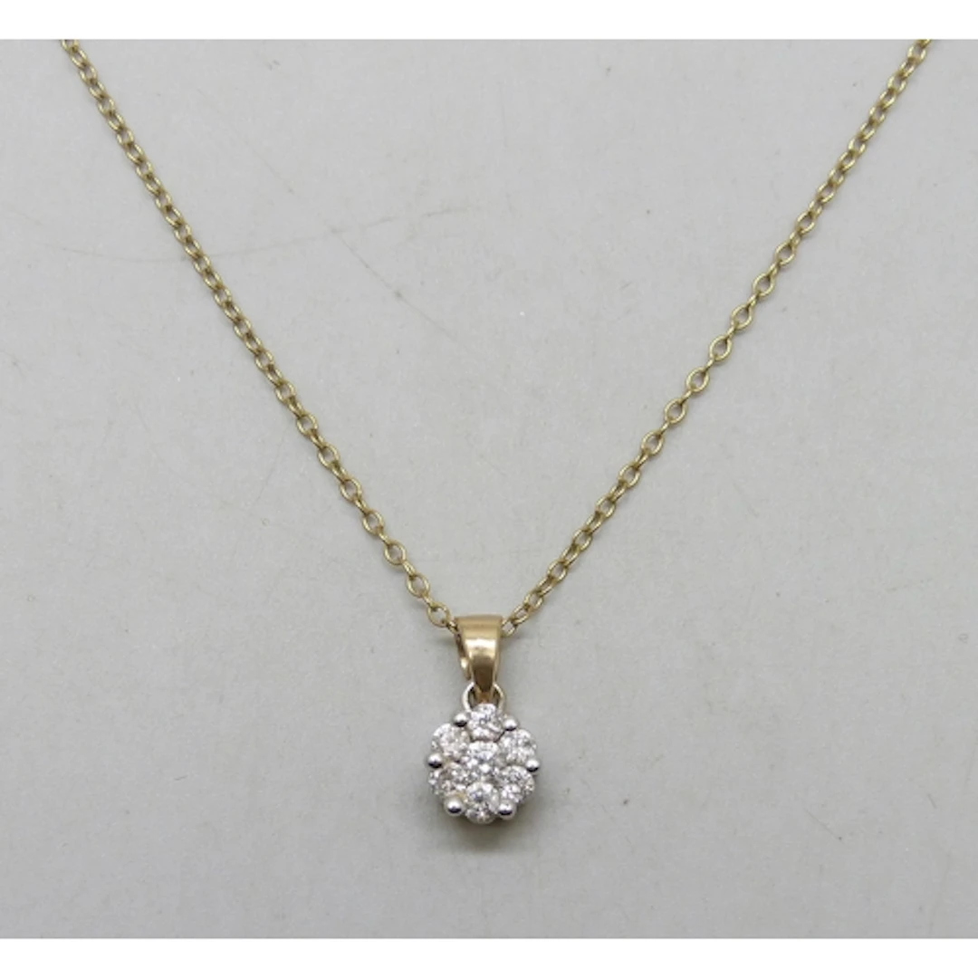 A 9ct gold diamond cluster pendant, .50ct total diamond weig...