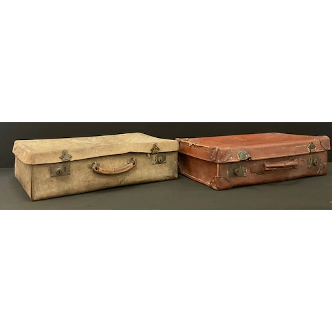 A pair of mid-20th century leather suitcases (2)