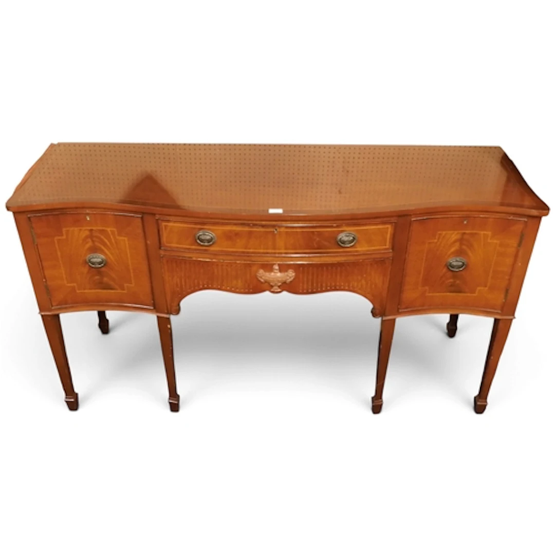 A 20th century mahogany veneered serpentine front sideboard ...