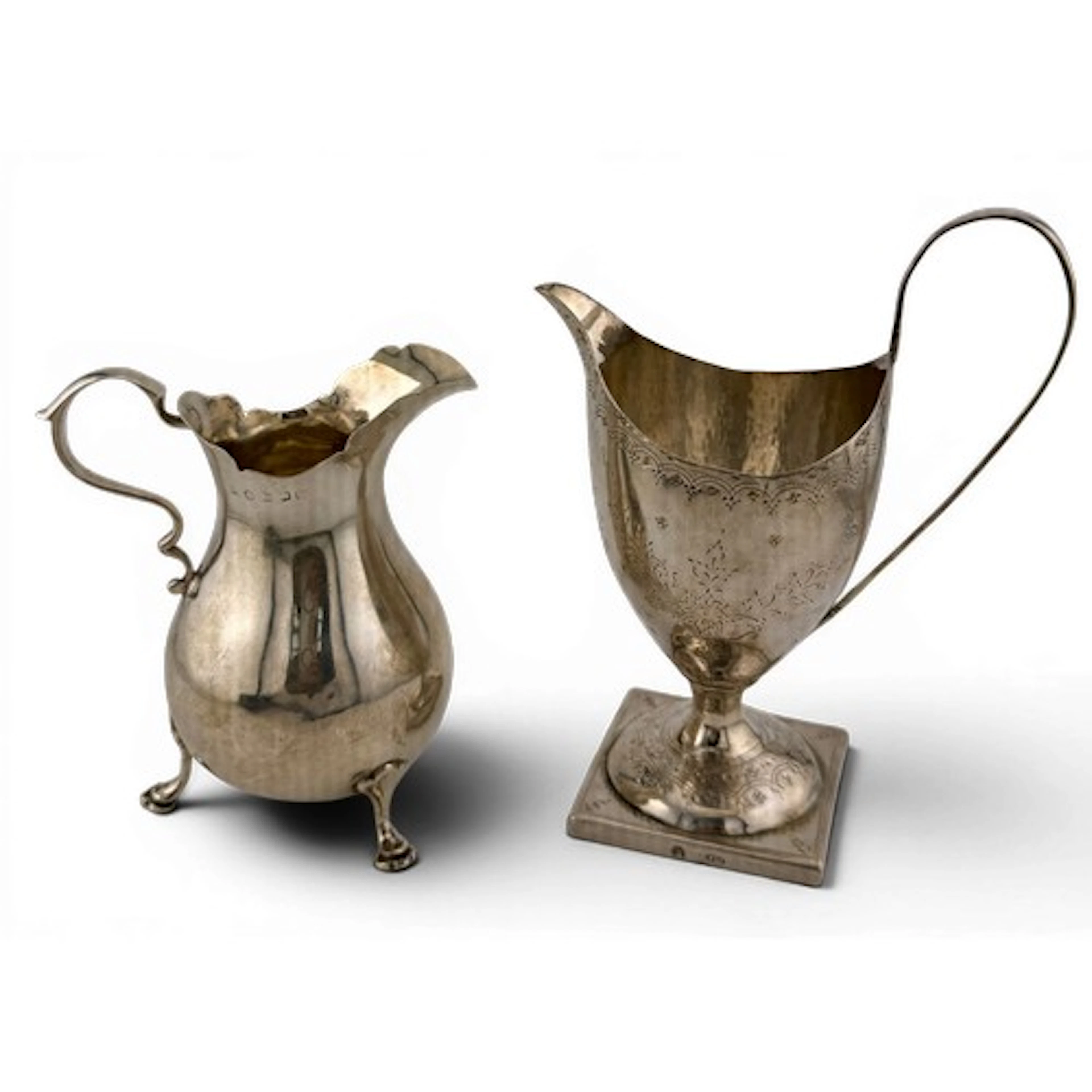 A Victorian and a Georgian hallmarked silver cream jug. Tota...