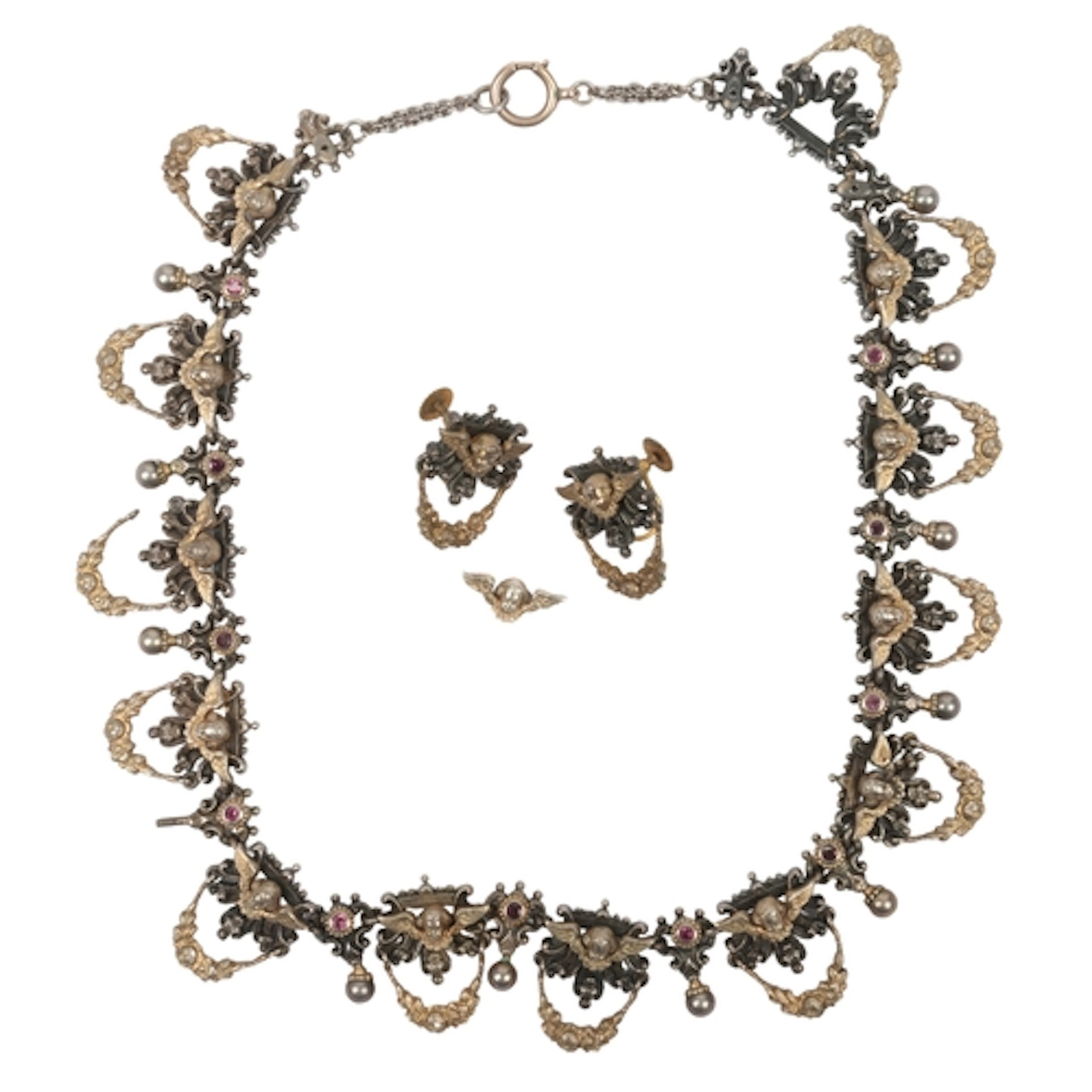 A silver Renaissance Revival demi-parure, late 19th century ...