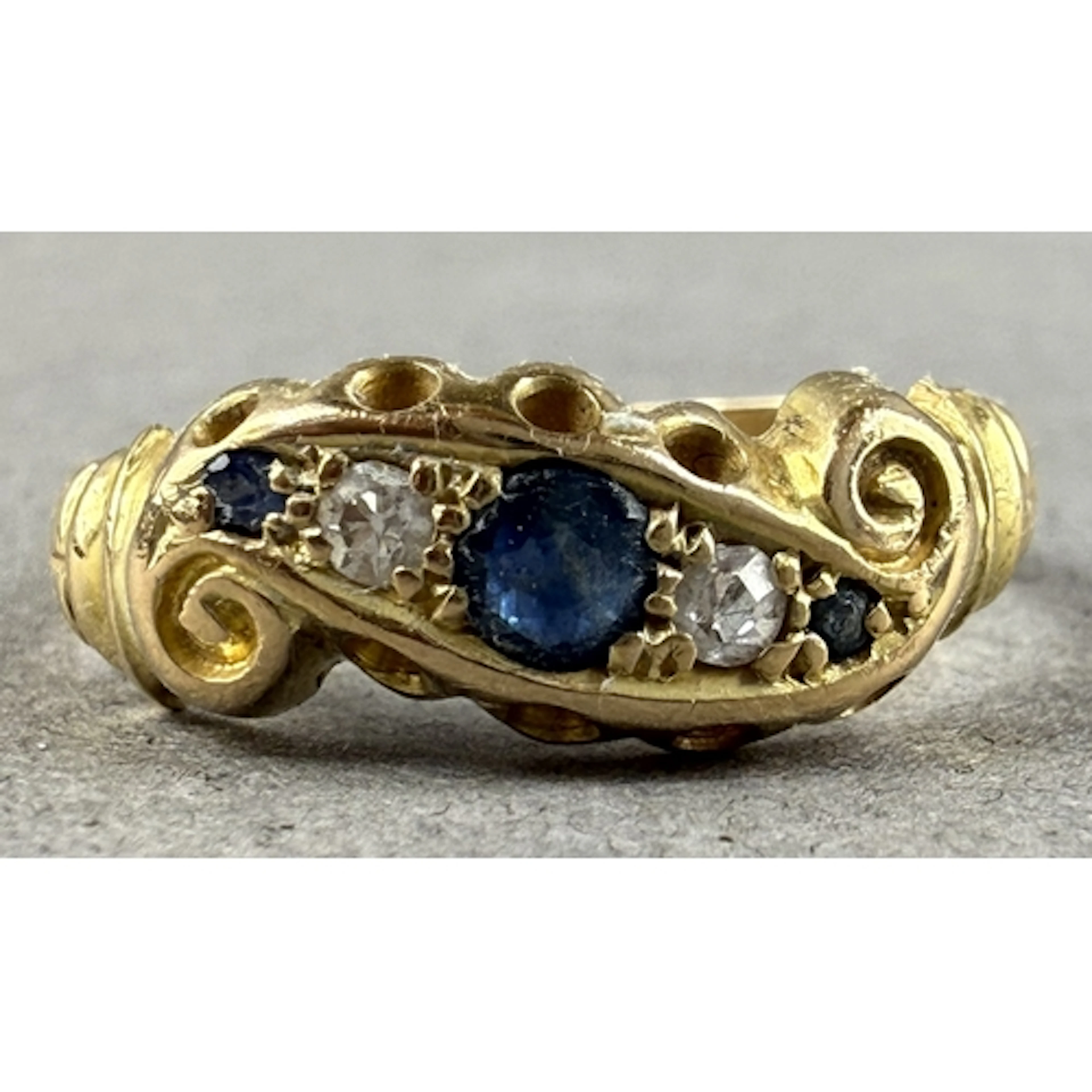 Jewellery: a yellow metal ring, marked 9ct and testing as go...