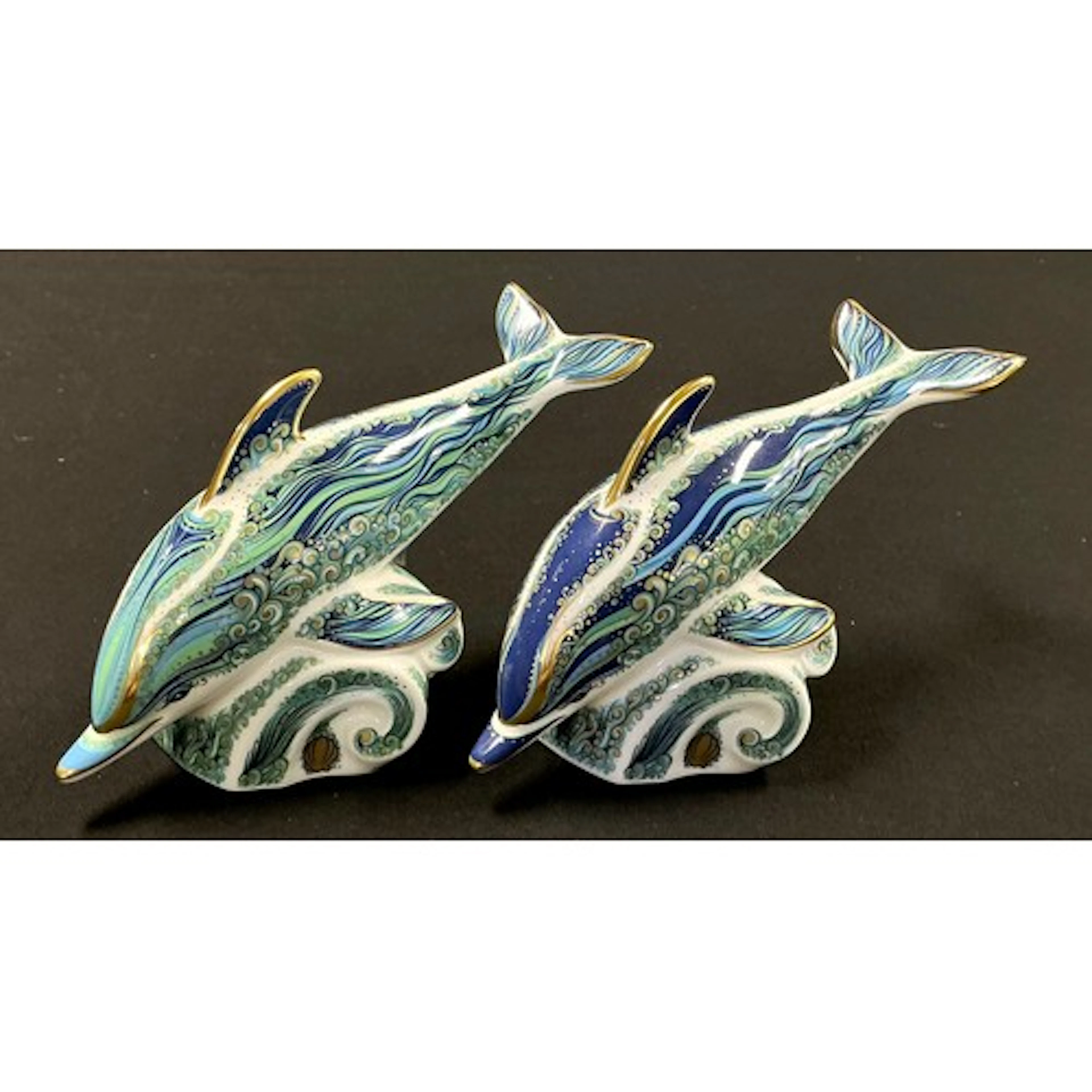 A pair of Royal Crown Derby paperweights, modelled as “The R...