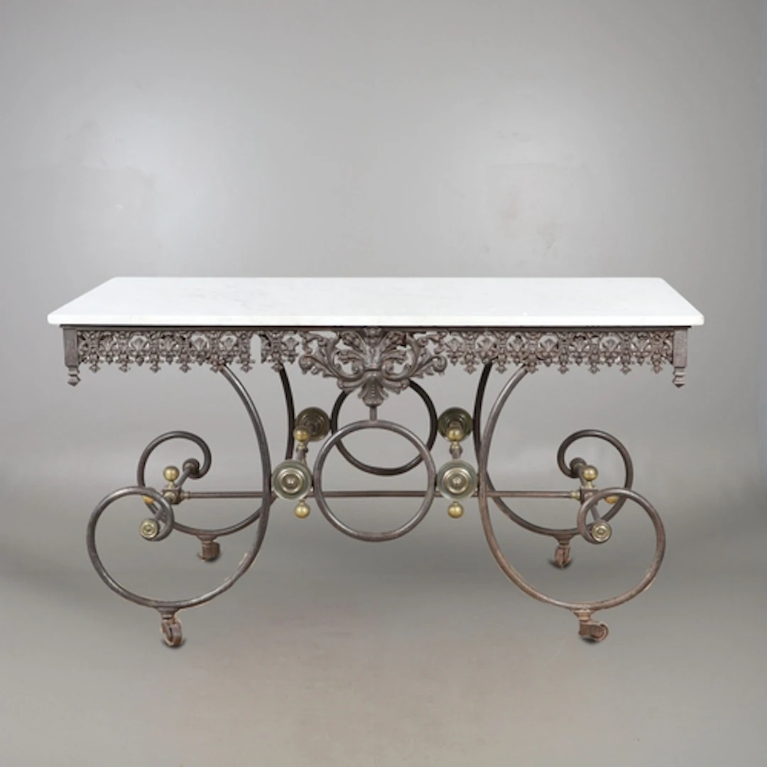 A FRENCH WROUGHT IRON AND MARBLE PATISSERIE OR CONSOLE TABLE...