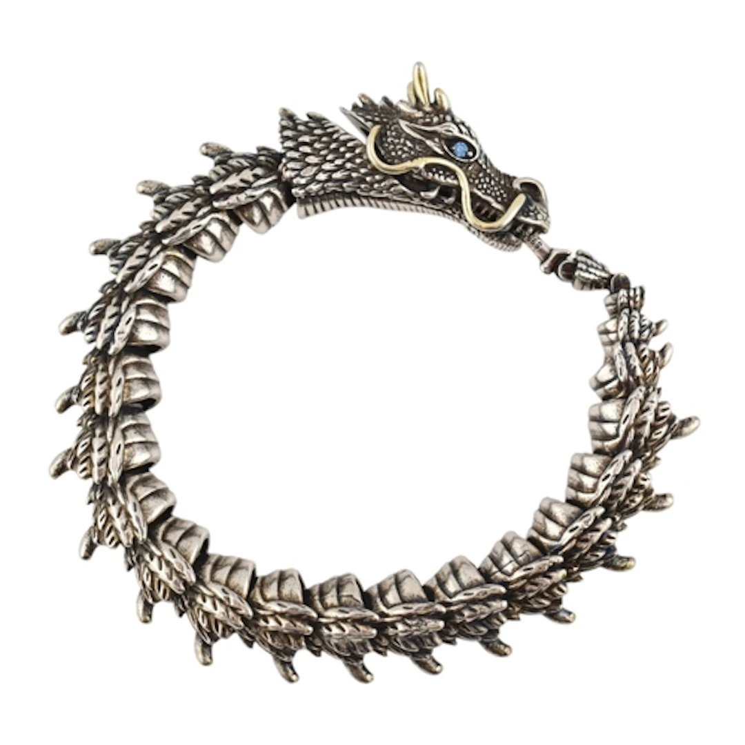 Statement contemporary silver dragon bracelet with blue past...