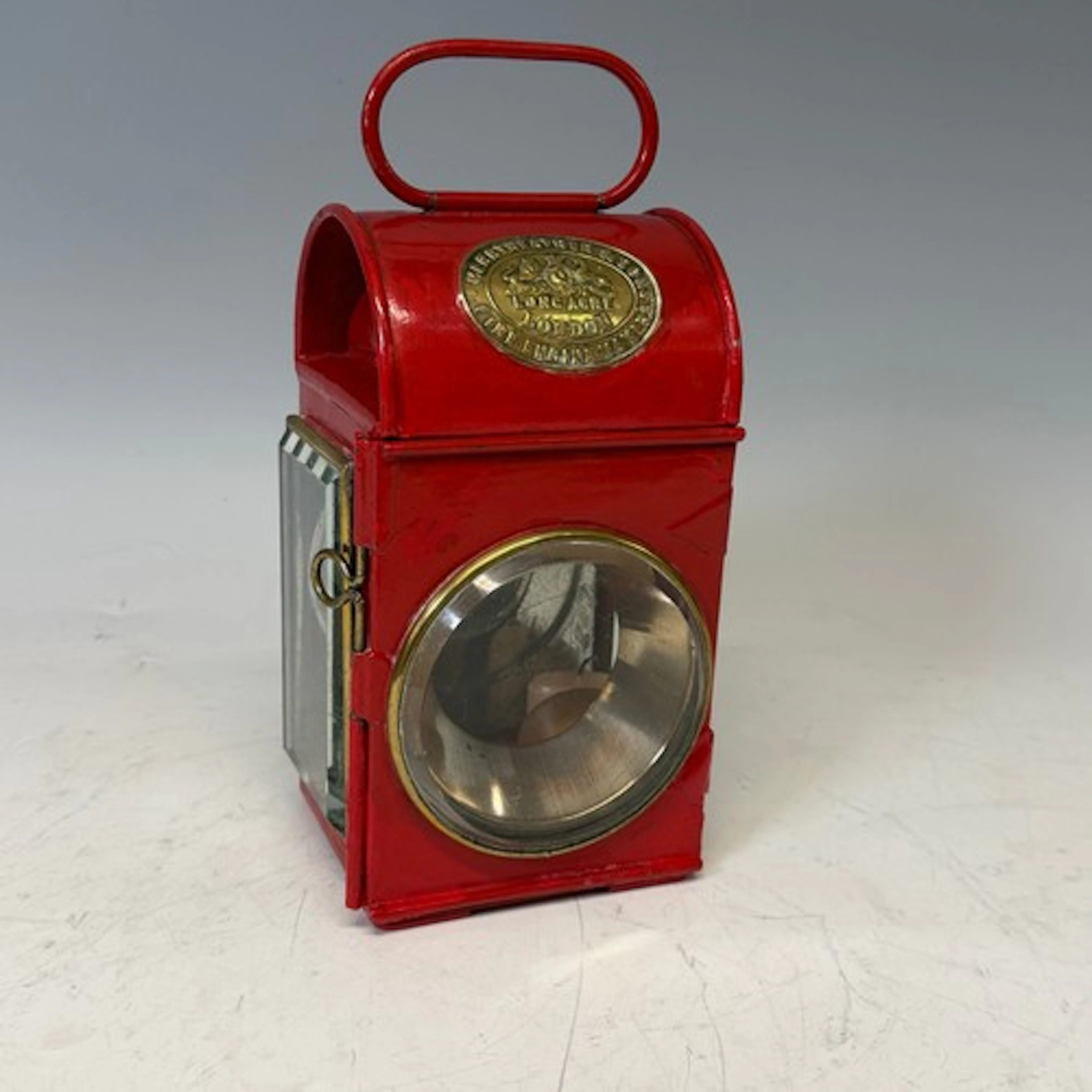 A painted red copper and brass oil lamp Lantern, by "Merrywe...