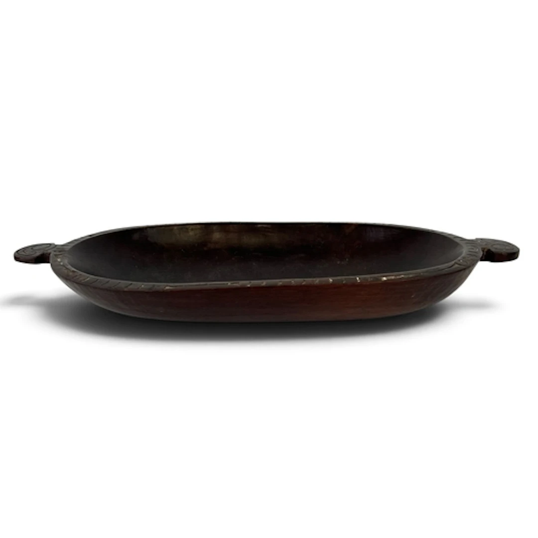 A 20TH CENTURY OCEANIC CARVED WOODEN DISH From the Massim Pe...