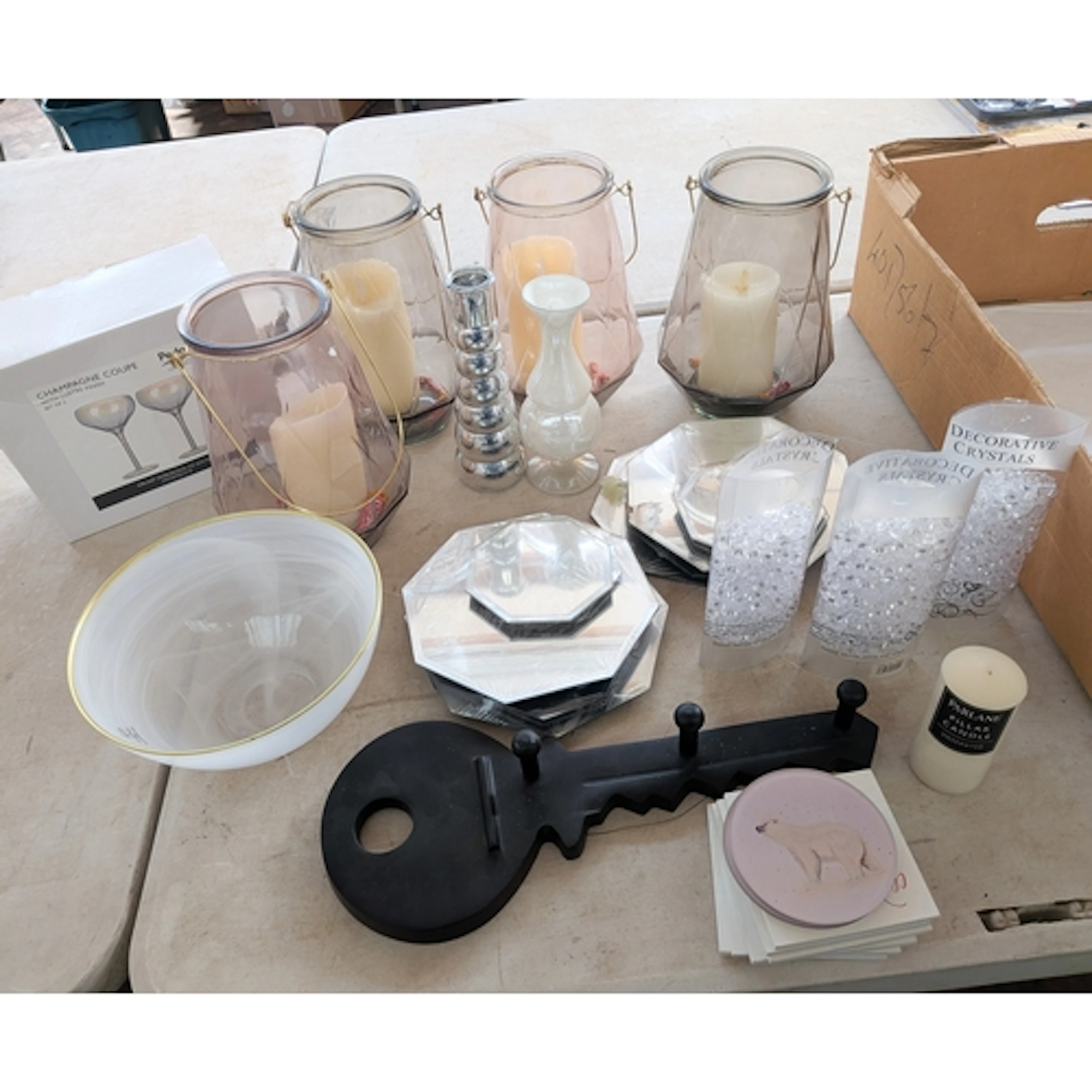 Two boxes of modern home wares to include a key shaped coat ...