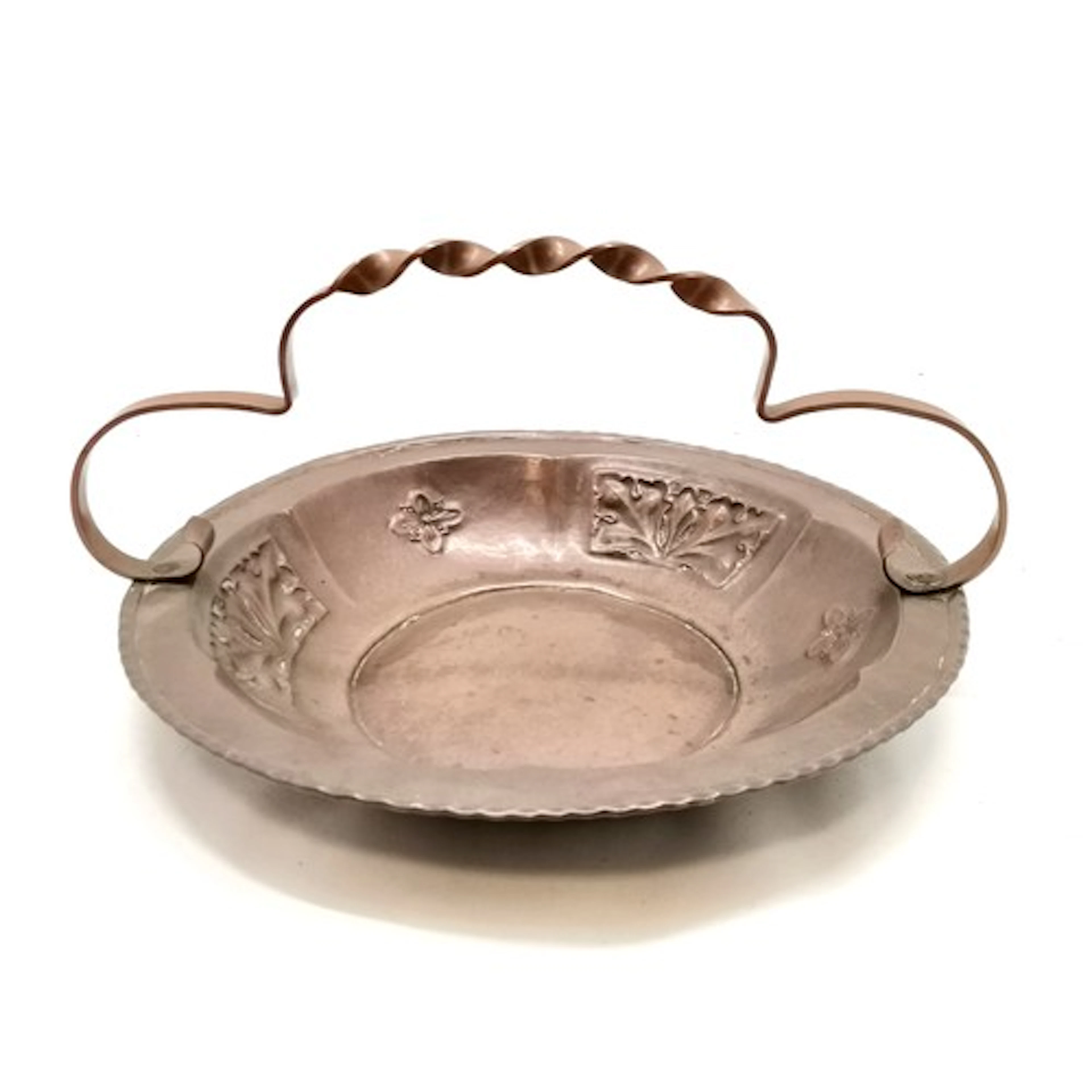 Arts and Crafts copper circular handled dish with hand worke...