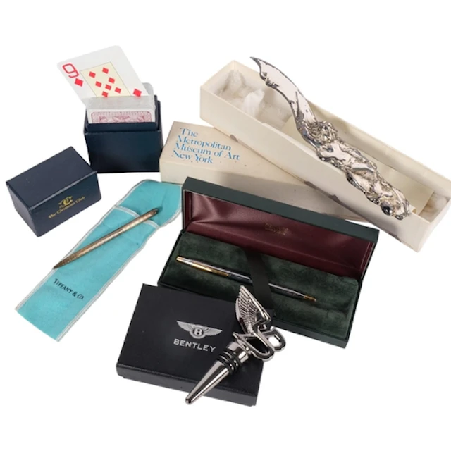 A group of various items, including a Bentley boxed bottle s...