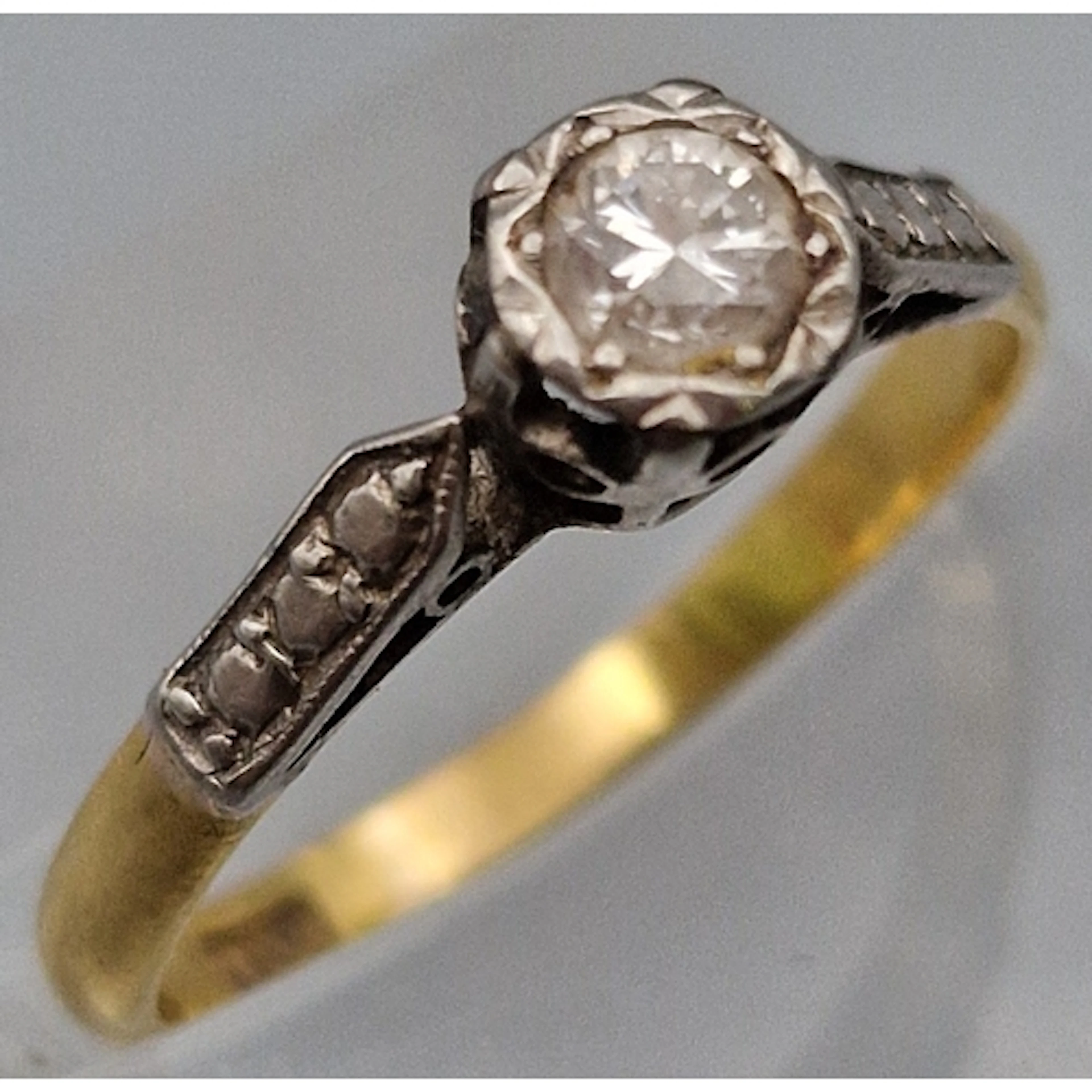 18ct gold diamond solitaire ring. 2.2g approx. Size N. (B.P....