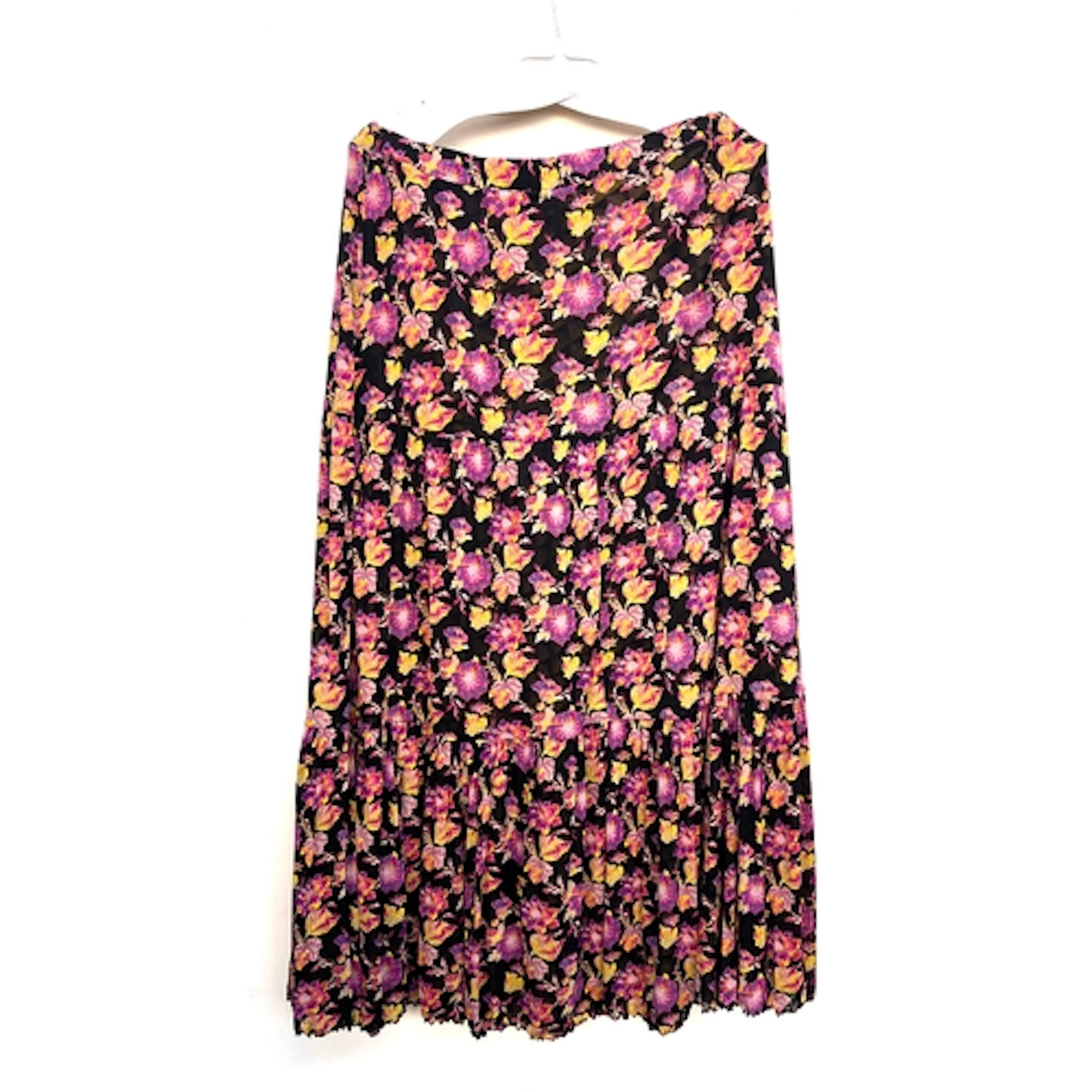 A reversible skirt in a brown, pink and yellow print, one si...