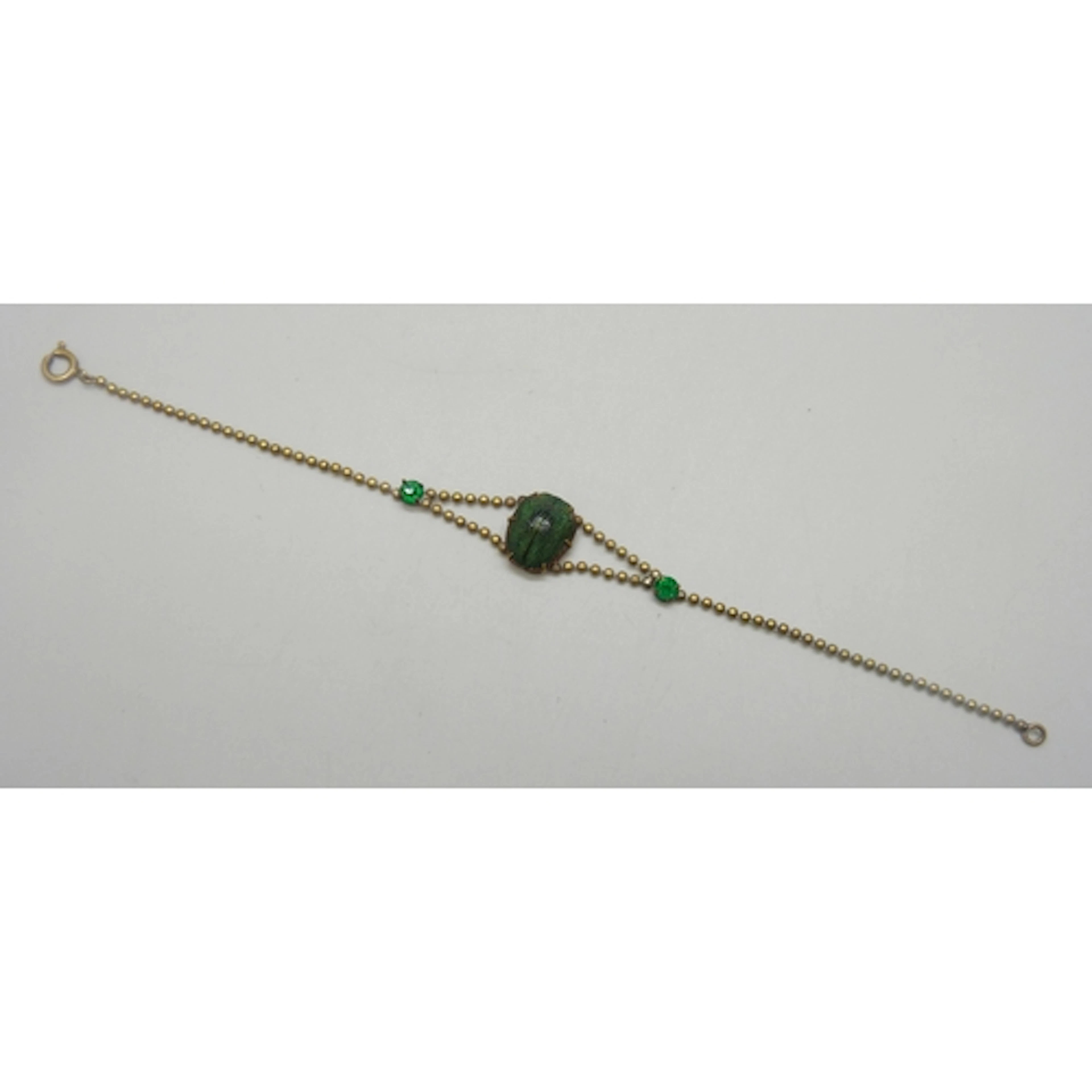 An Egyptian Revival bracelet with scarab beetle design, 19.7...