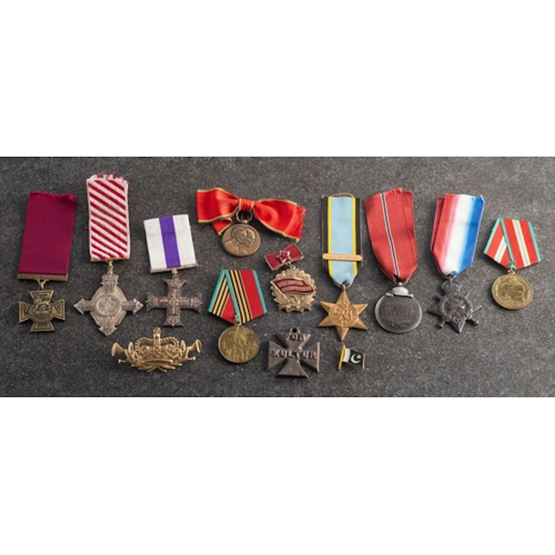 A group of reproduction medals, including a Naval Gold Medal...