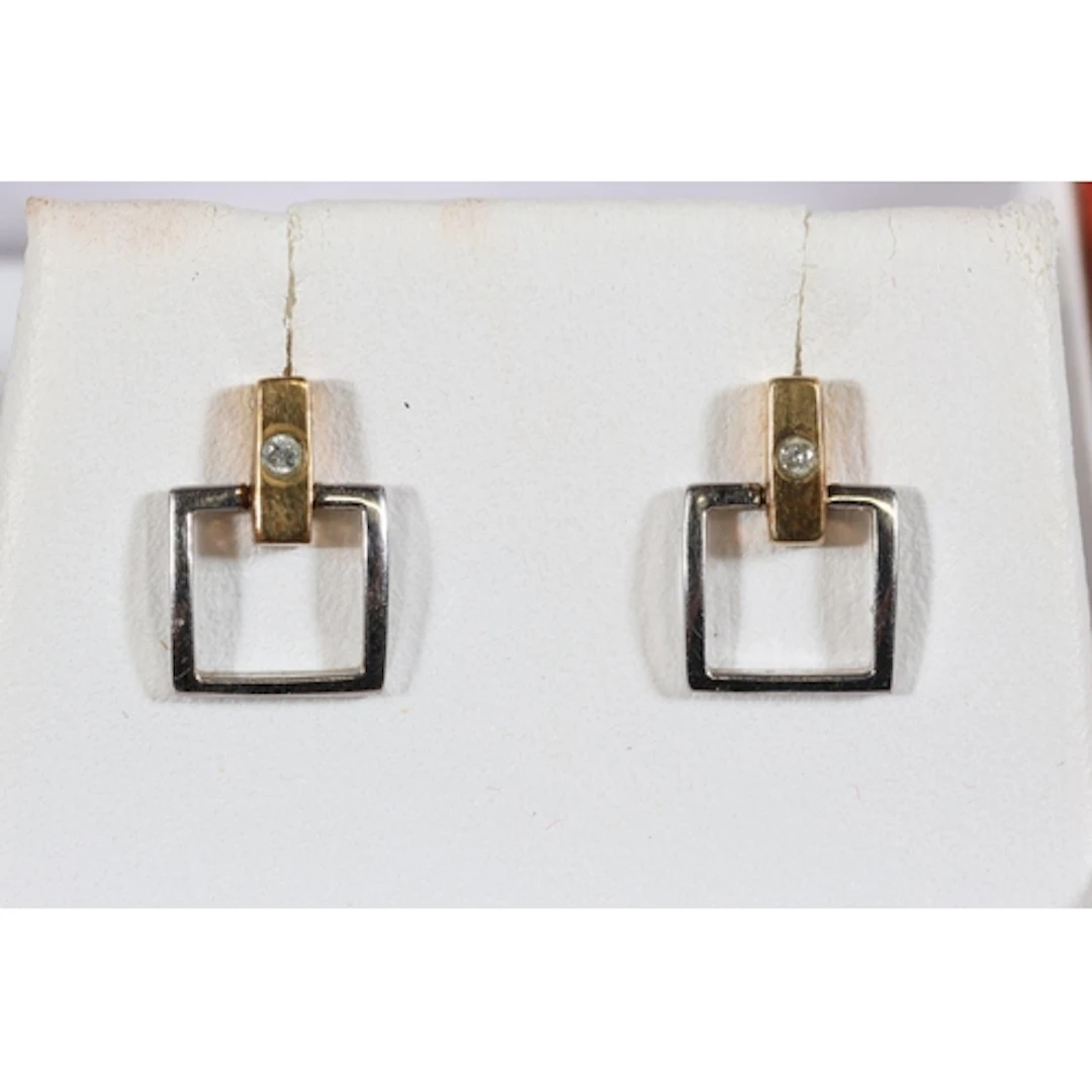 Pair of Hot Diamonds 9ct gold earrings, 1.7g gross, held in ...
