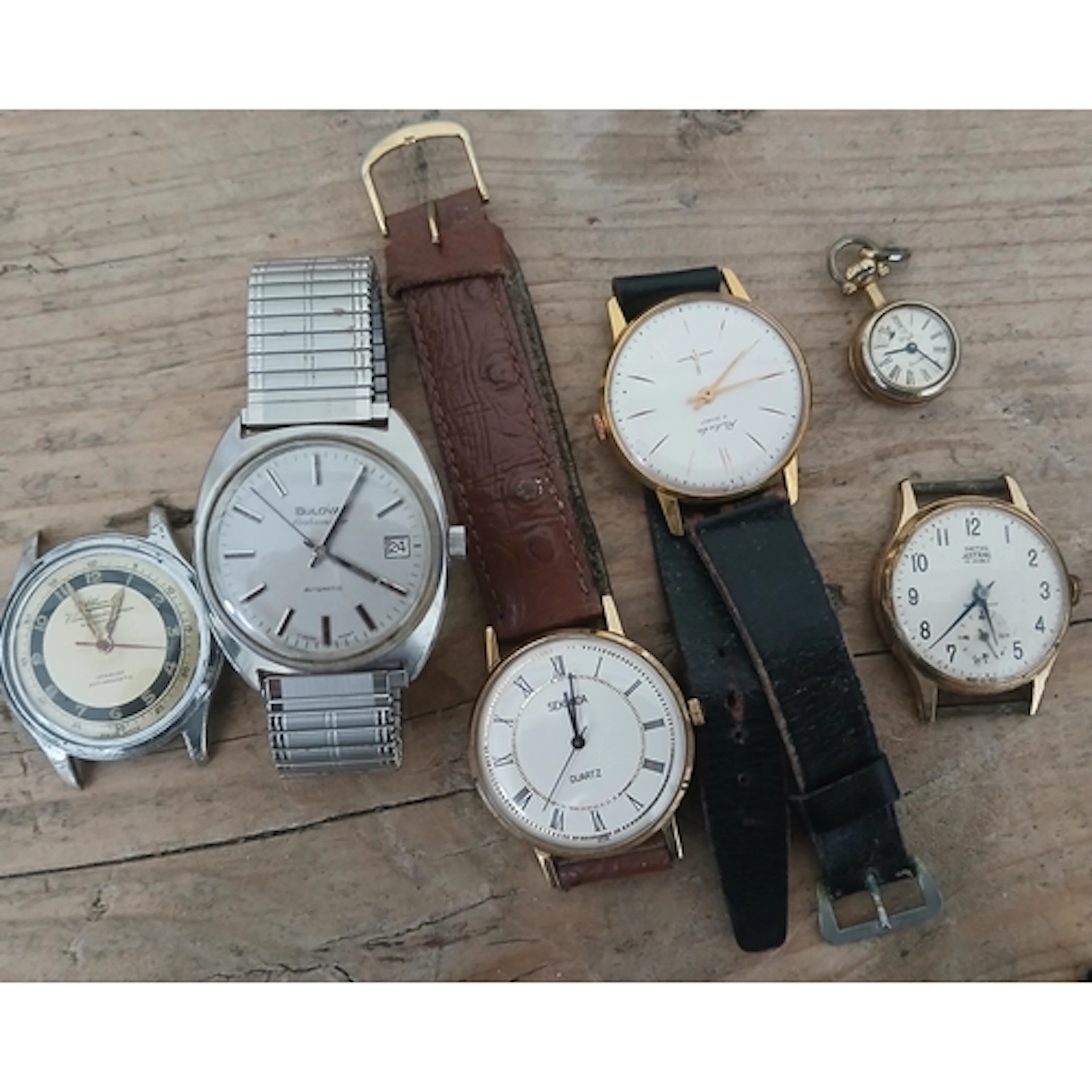 Assorted vintage watches including a Bulova Ambassador.