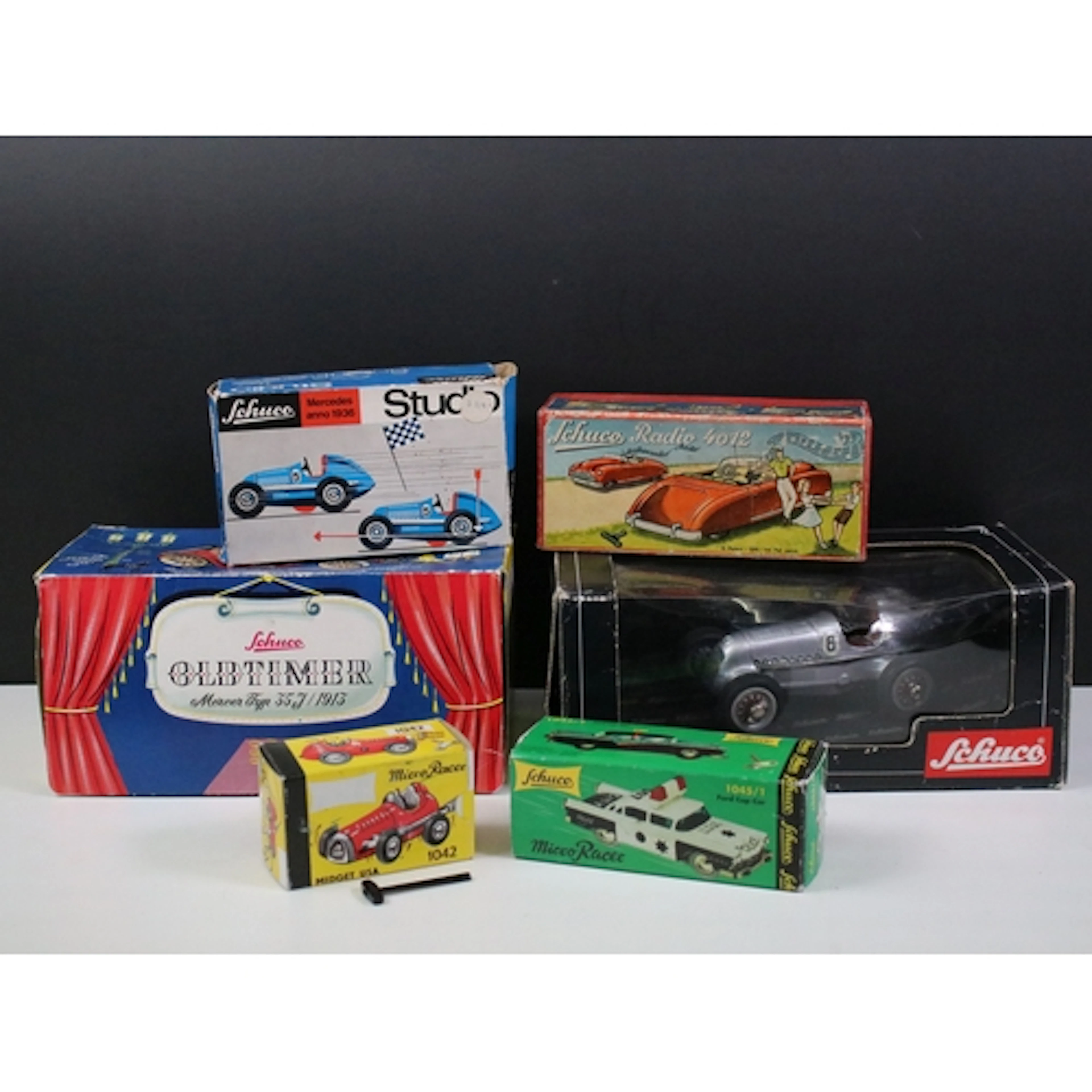 Six boxed Schuco tinplate and clockwork models to include St...