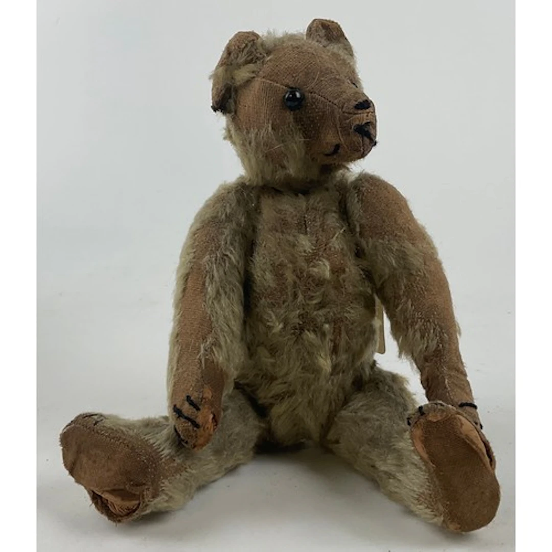 An early 20th century small mohair jointed teddy bear, with ...