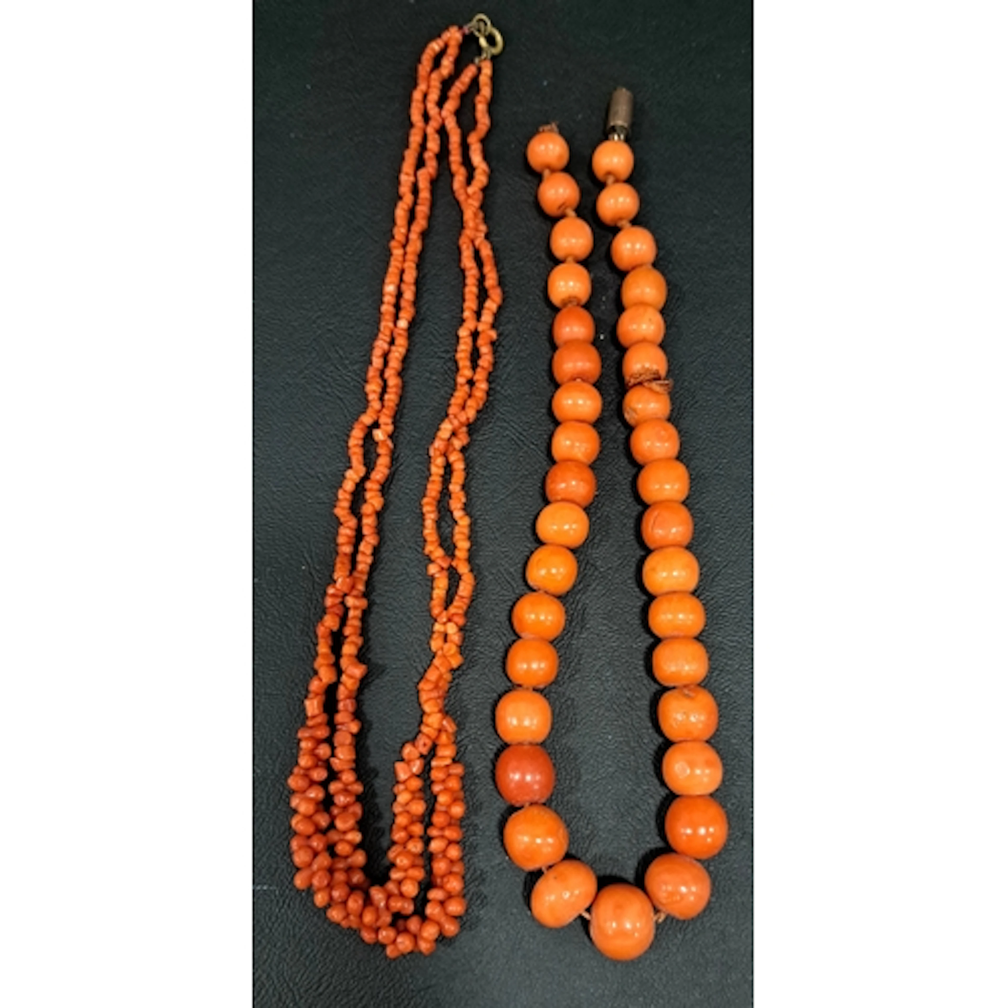 TWO CORAL BEAD NECKLACES comprising one with graduated beads...