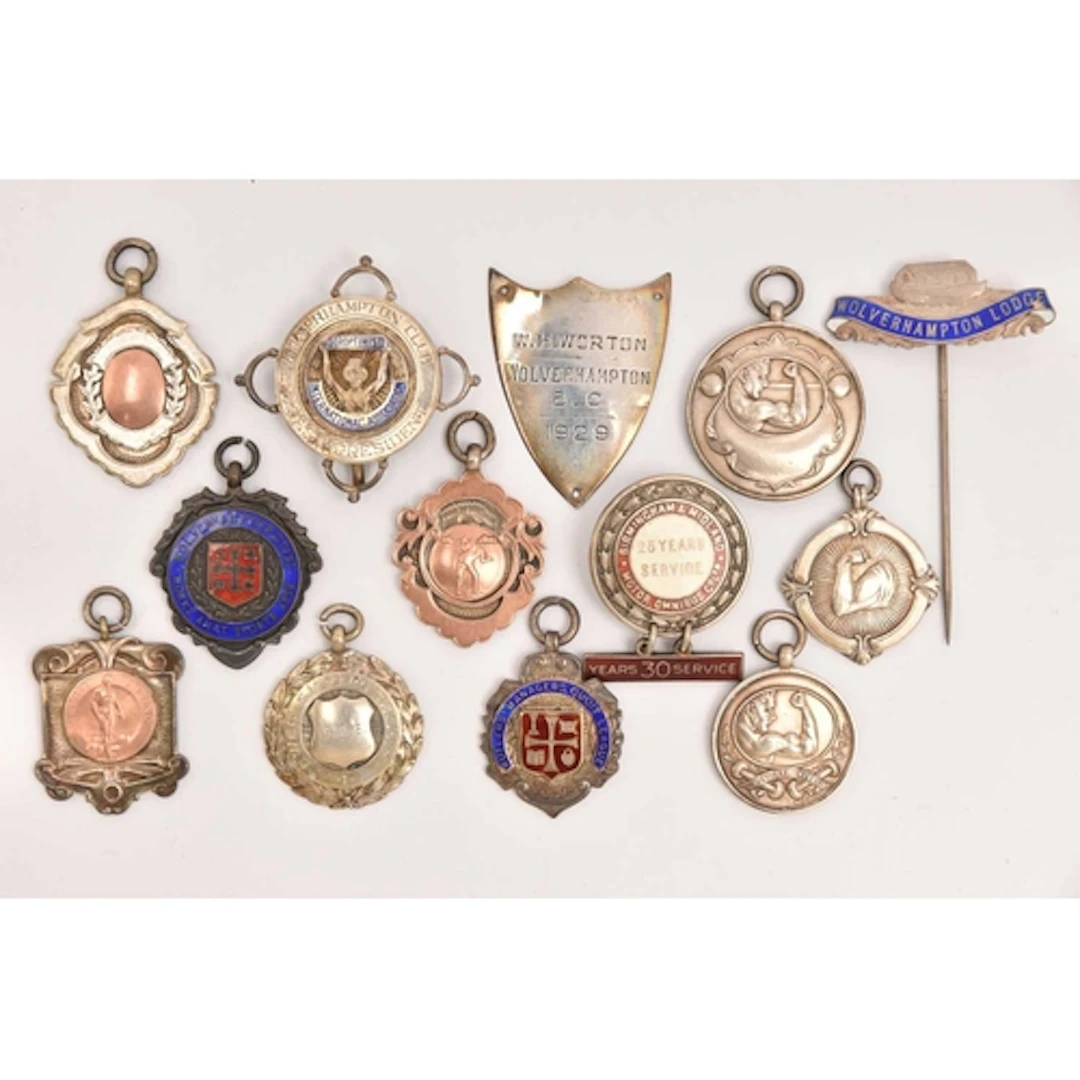 AN ASSORTMENT OF SILVER MEDALS, CAP BADGES, STICK PIN, BROOC...
