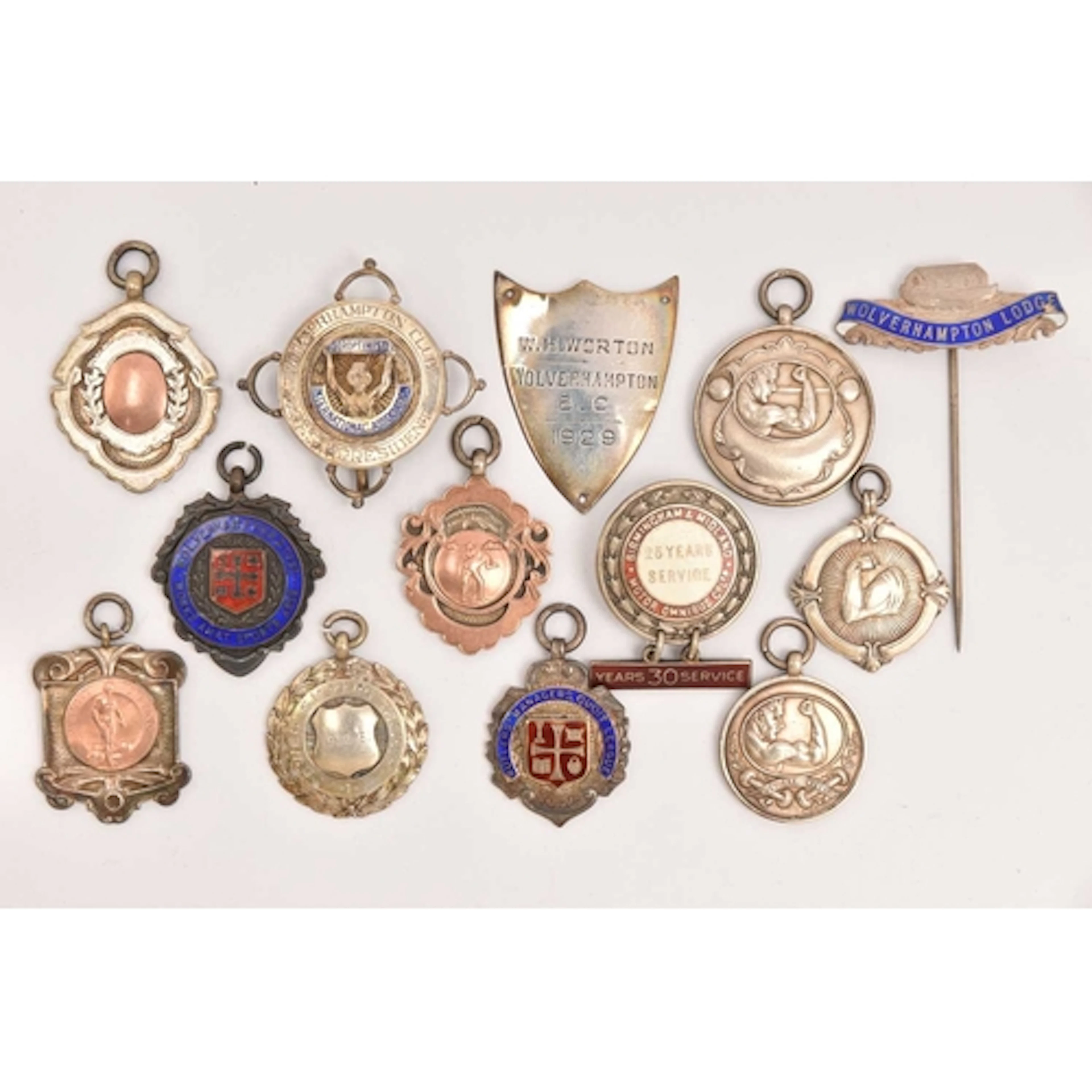 AN ASSORTMENT OF SILVER MEDALS, CAP BADGES, STICK PIN, BROOC...