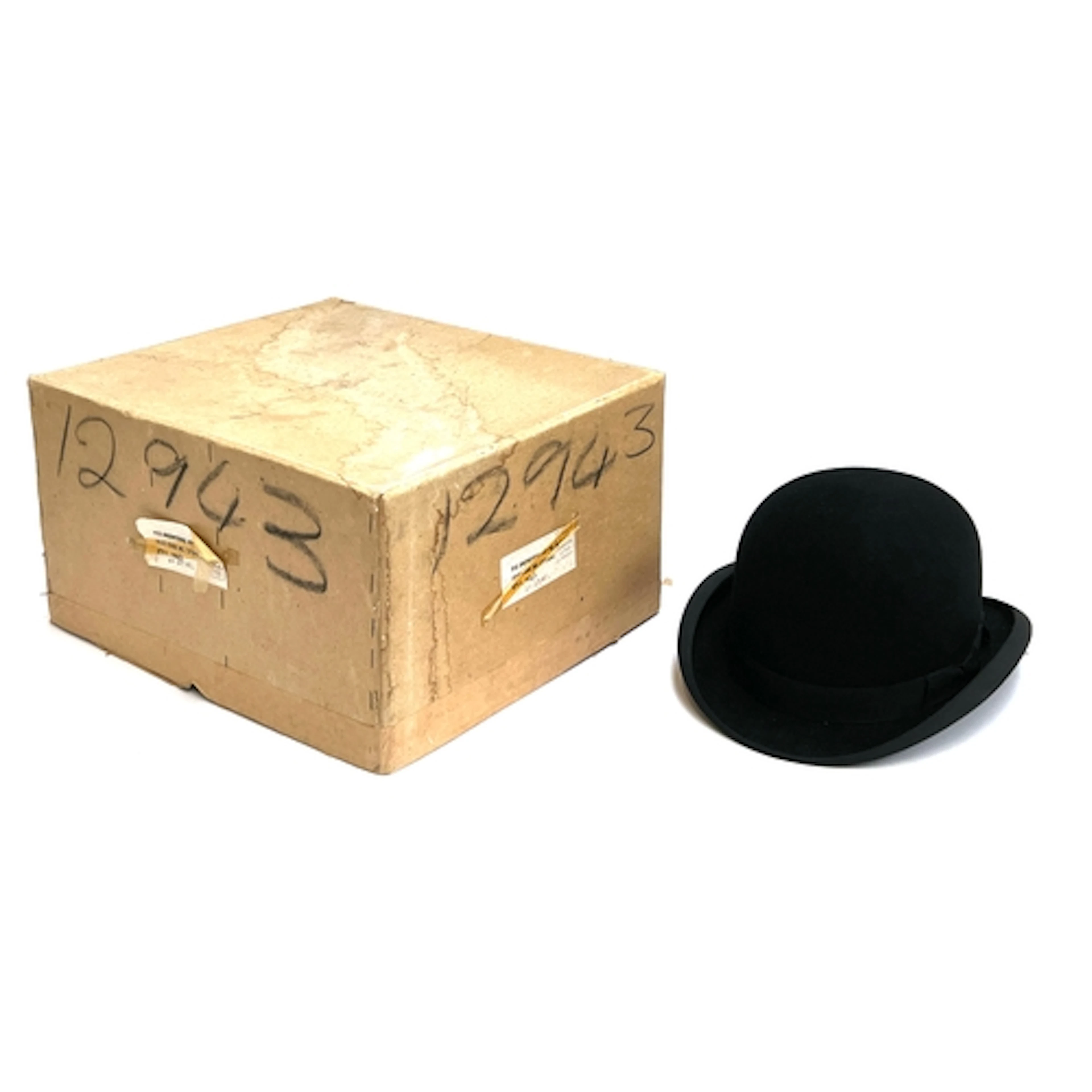 A black felt bowler hat, 8" front to back, 6" 1/2 side to si...