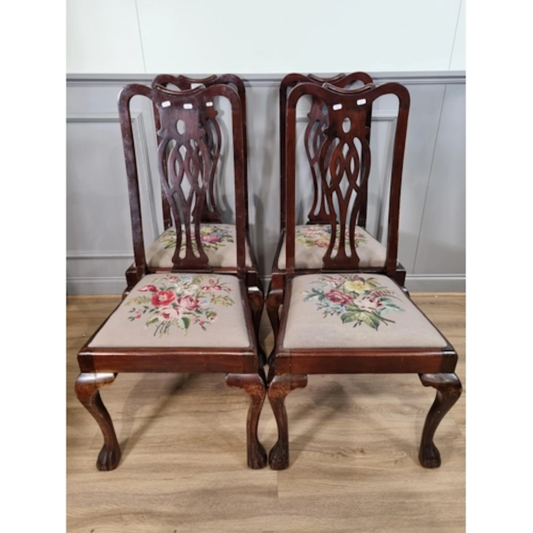 A set of four tall mahogany pierced splat back Dining chairs...