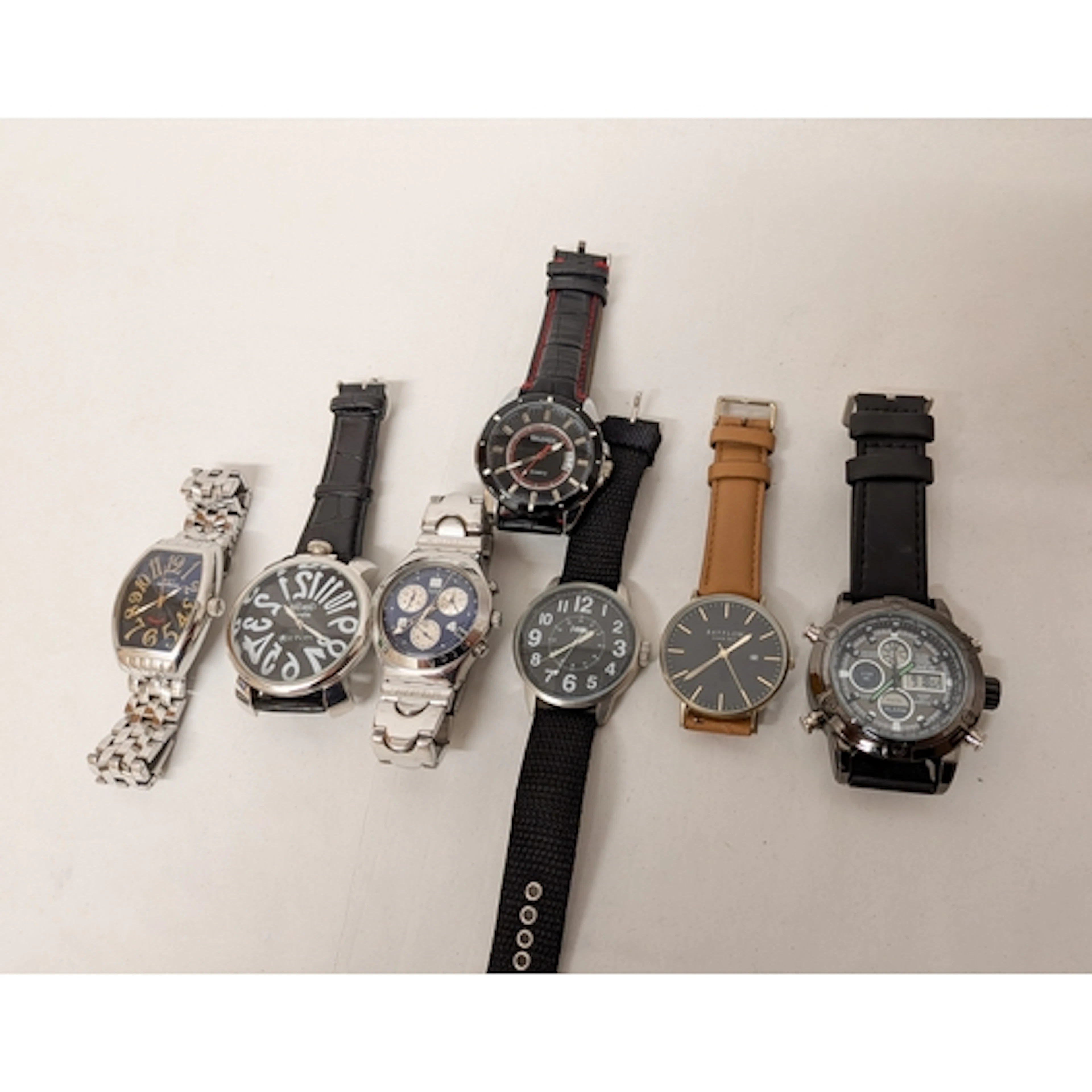 A collection of seven modern gents dress watches to include ...