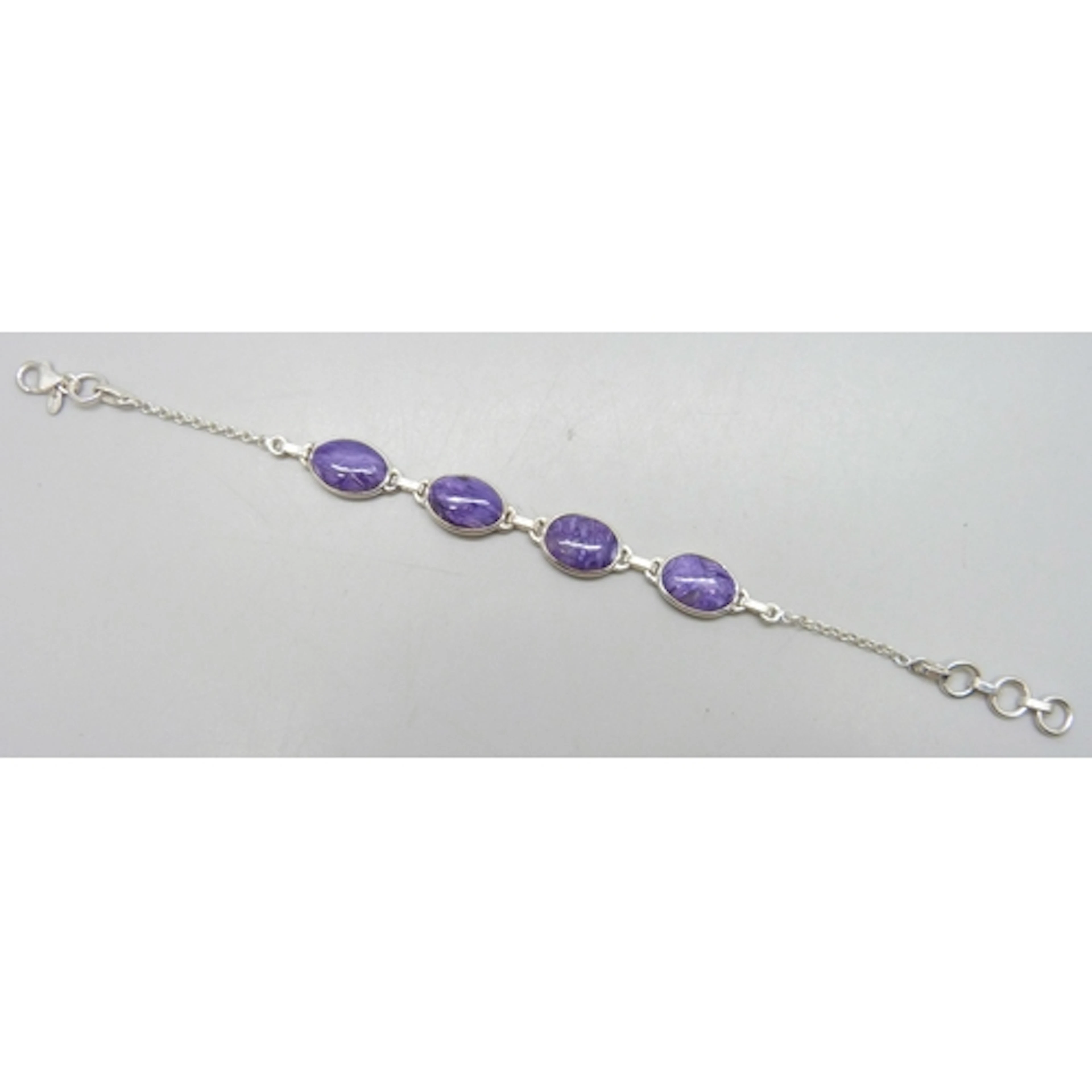 A 21.31ct charoite silver bracelet, stone size 4 x 14 x 10mm...