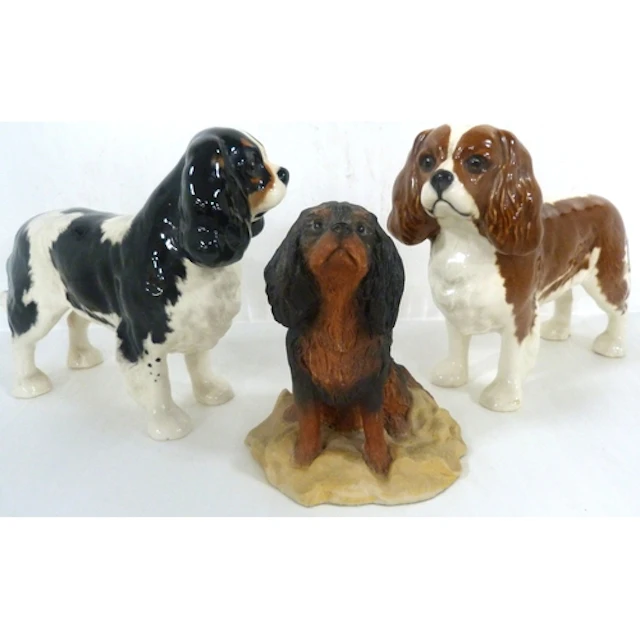 Two Beswick King Charles spaniel dog figures, and another sm...