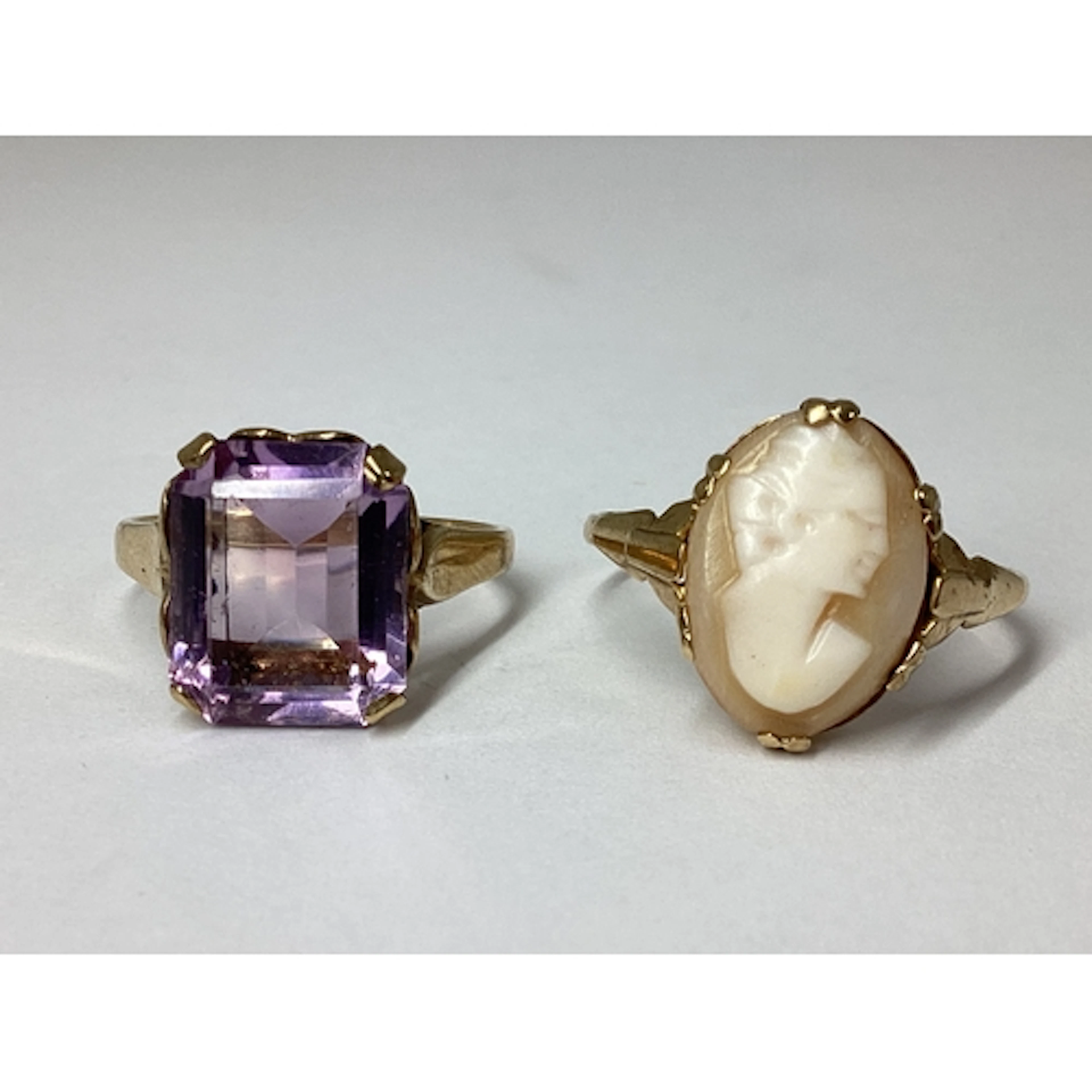 A 9ct Gold Single Stone Dress Ring, claw set, within ornate ...
