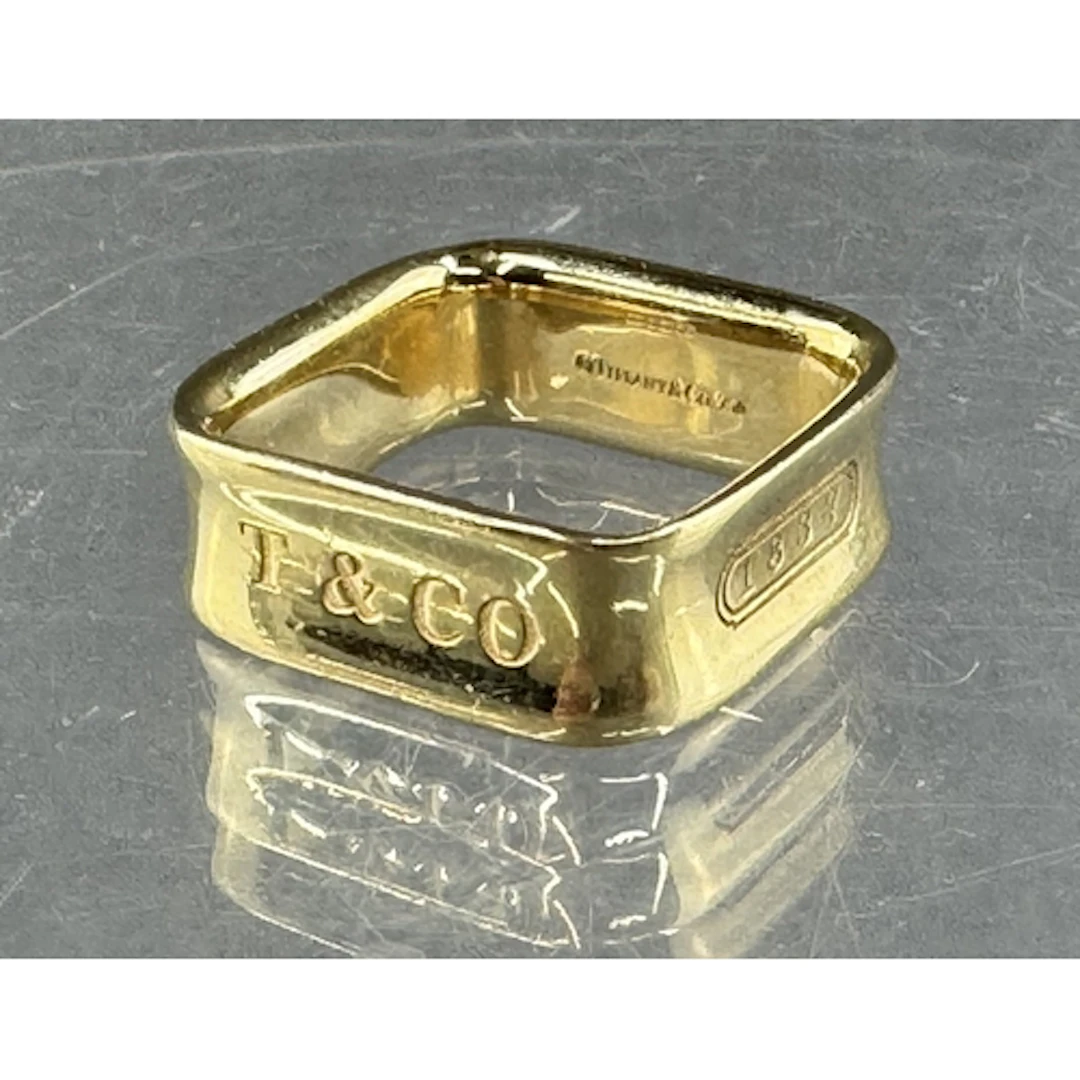 Jewellery: an 18ct yellow gold square ring by Tiffany & ...